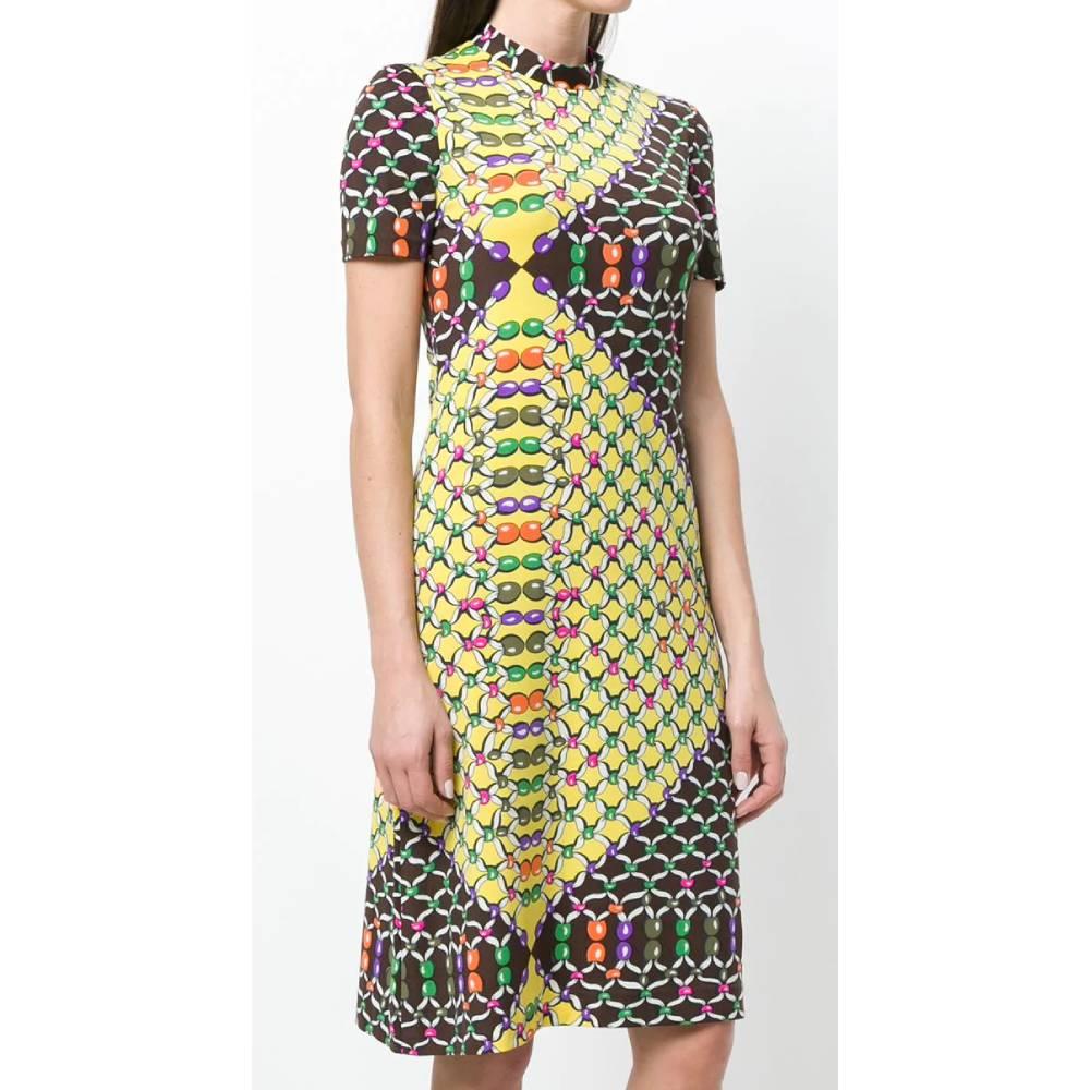 Lanvin flared short-sleeved dress, with all-over multicolor print, with round neckline, invisible zip closure on the back. Knee length.
Year: 60s

Made in France

Size: 42 FR

Linear measures

Height: 109 cm
Bust: 45 cm 
Waist: 46 cm
Shoulders: 40