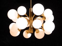 1960s, Large Brass and Sixteen Glass Globes Shades Chandelier by Kaiser Leuchten