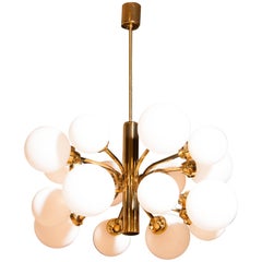 1960s, Large Brass and Sixteen Glass Globes Shades Chandelier by Kaiser Leuchten