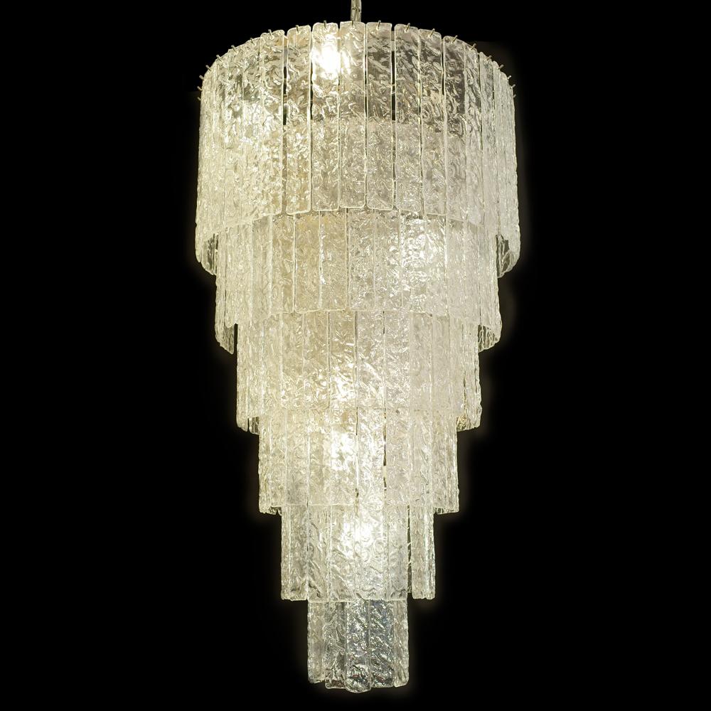 A very impressive 12 light bulbs ceiling light designed originally in the early 50s by Venini one of the top Murano's firm of Master glass makers in Murano island in Italy.This glass component called 