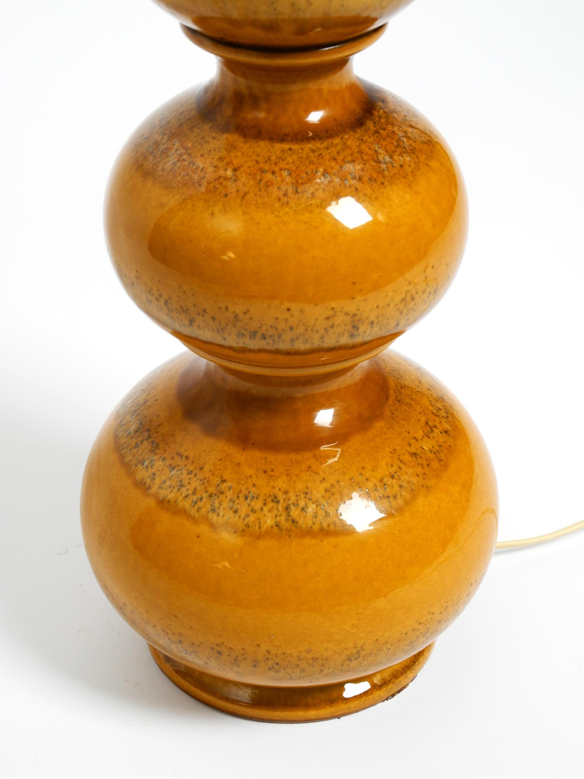 German 1960s large ceramic table or floor lamp in light brown from Kaiser Leuchten