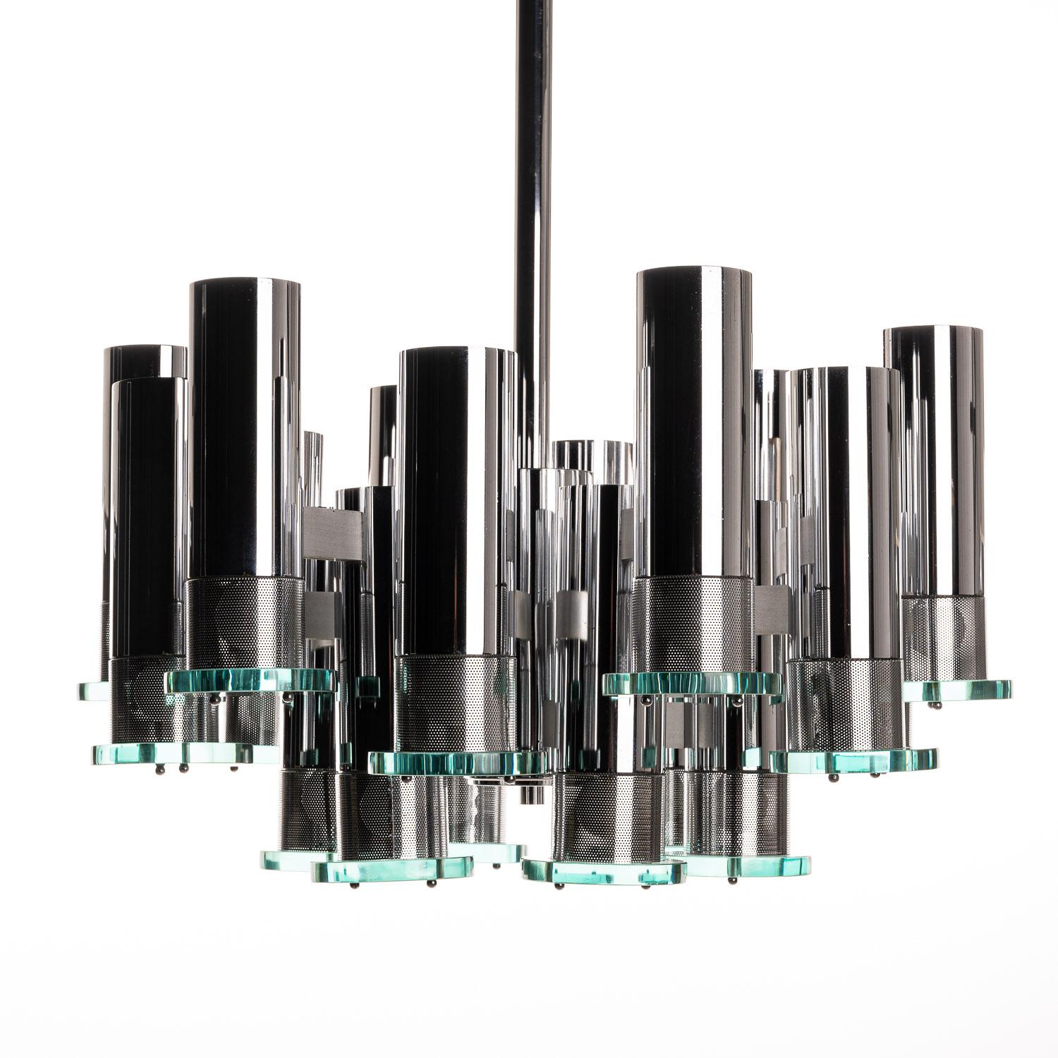For those that like a modern edge to their lighting, this piece is a truly stunning example. Personally one of my favorite pieces. Attributed to designers Fontana Arte, this 1960s light incorporates cylindrical tubing radiating from a central hub.