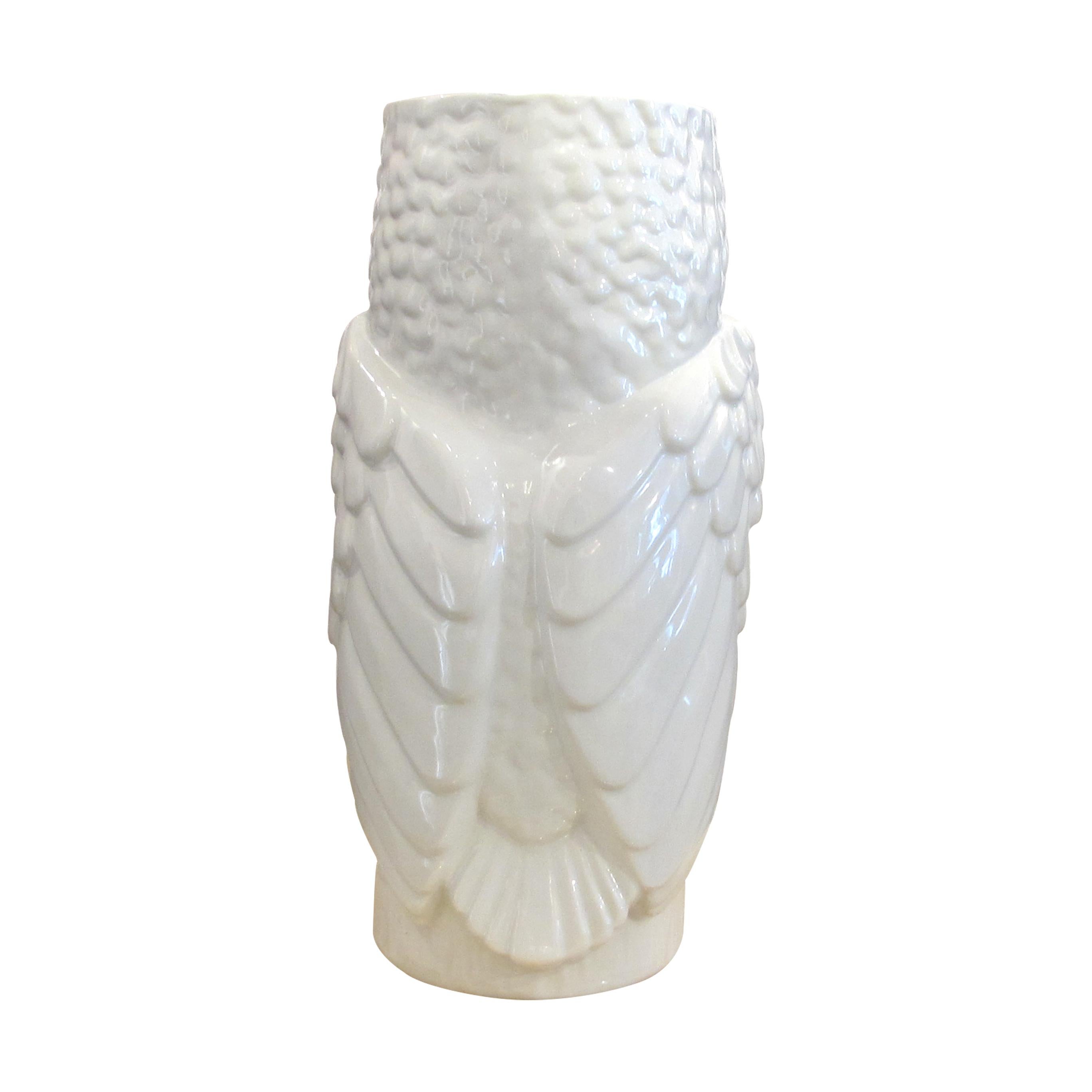 white ceramic owl vase