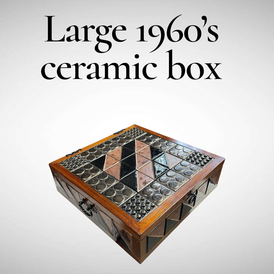 One of a kind large decorative box
Outside : exotic wood and ceramic
Inside suede and leather