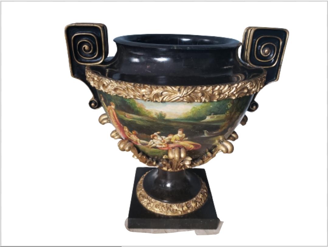 Beautiful Ormolu Ornate Marble Lite Urn in excellent condition. This Urn is also beautifully gilded with acanthus leaves and beautifully hand painted throughout. May be use as a planter if so desired.
Urns Measures 22W x 18D x 22H
Base is 10.5