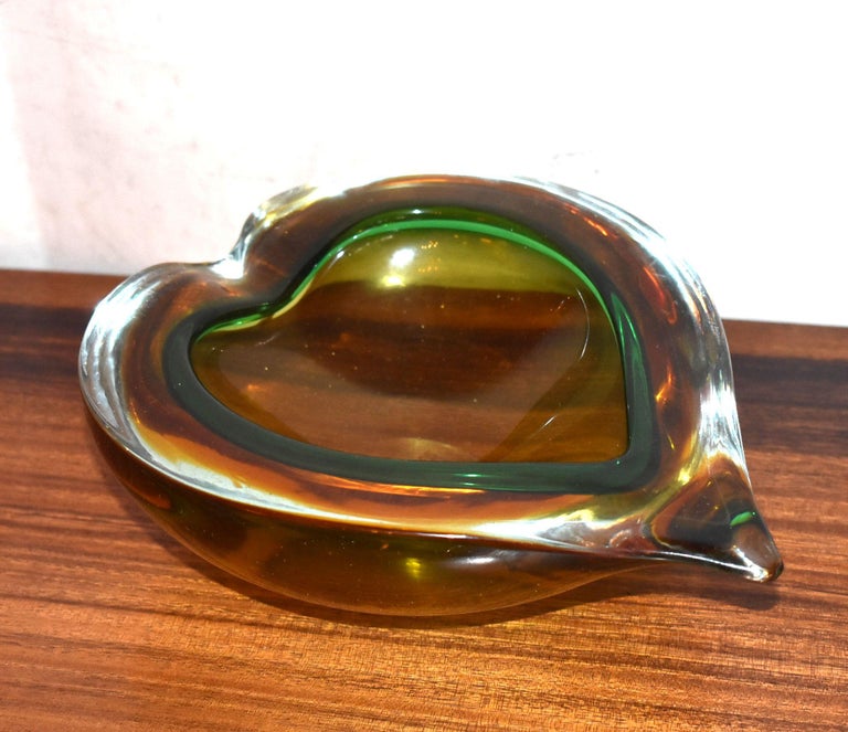 Italian green, clear and amber color Murano glass heart bowl or ashtray.
 