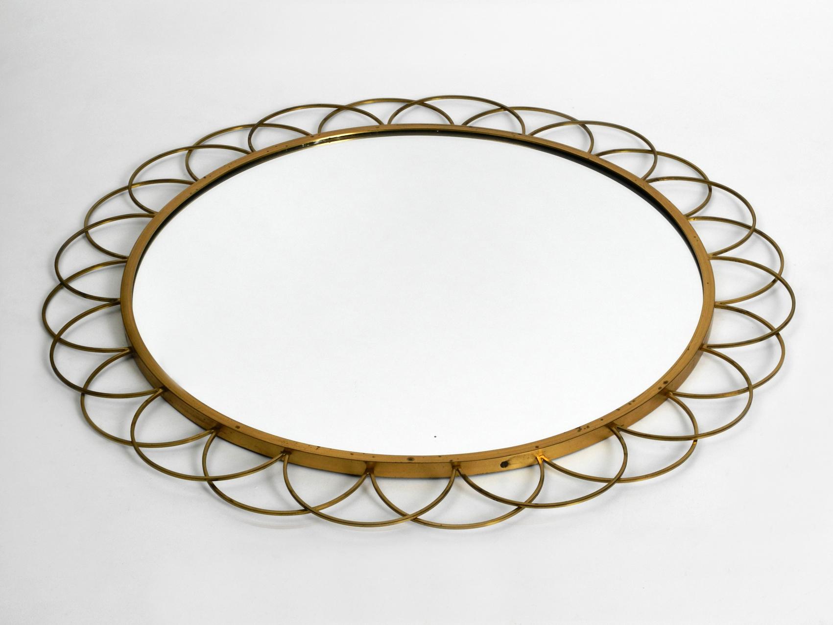 Mid-Century Modern 1960s Large Italian Brass Wall Mirror with Ring Design