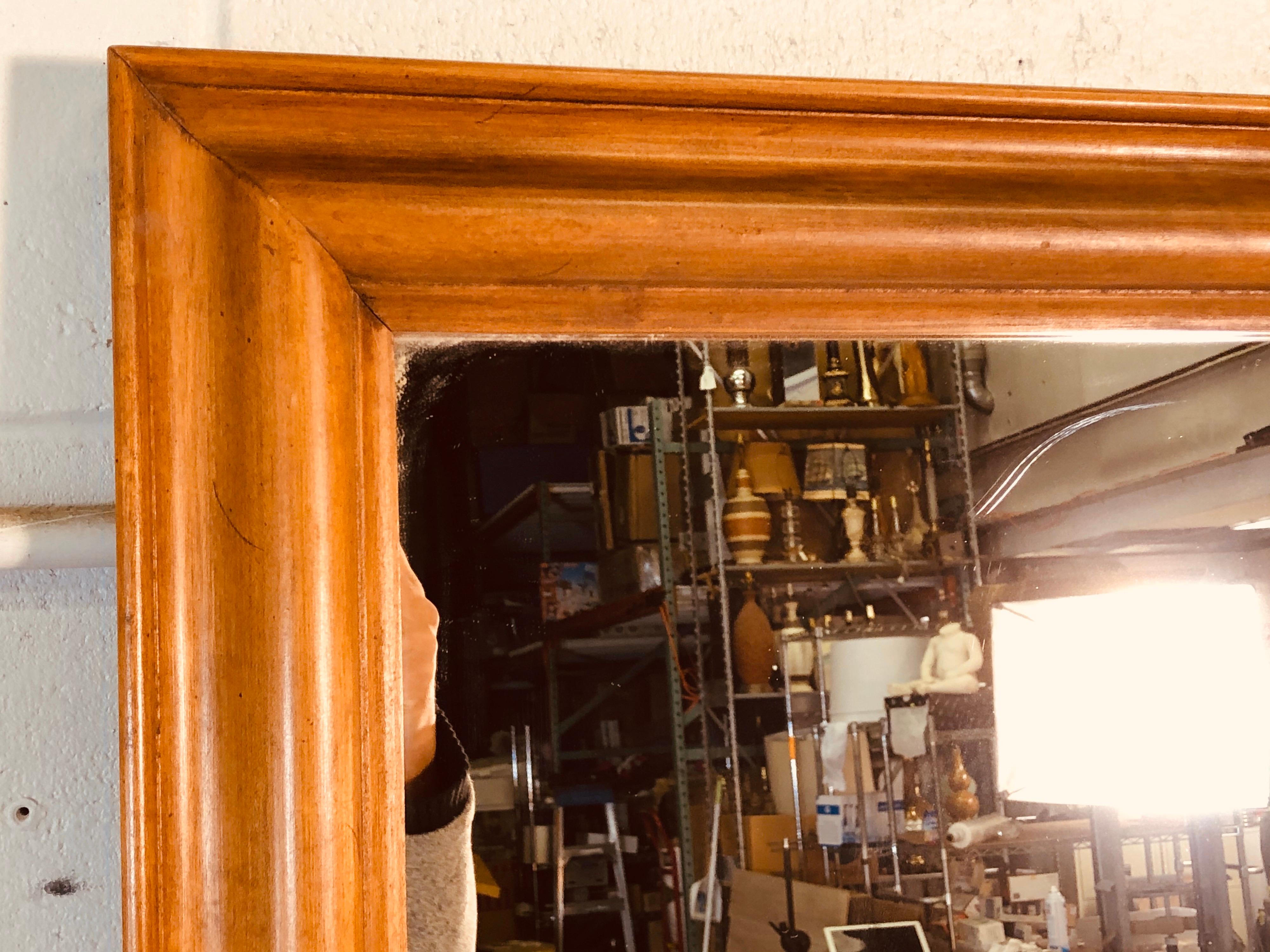 Vintage 1960s large wide framed maple wood wall mirror. Mirror could be hung either vertically or horizontally. No marks. Hardware is not included.