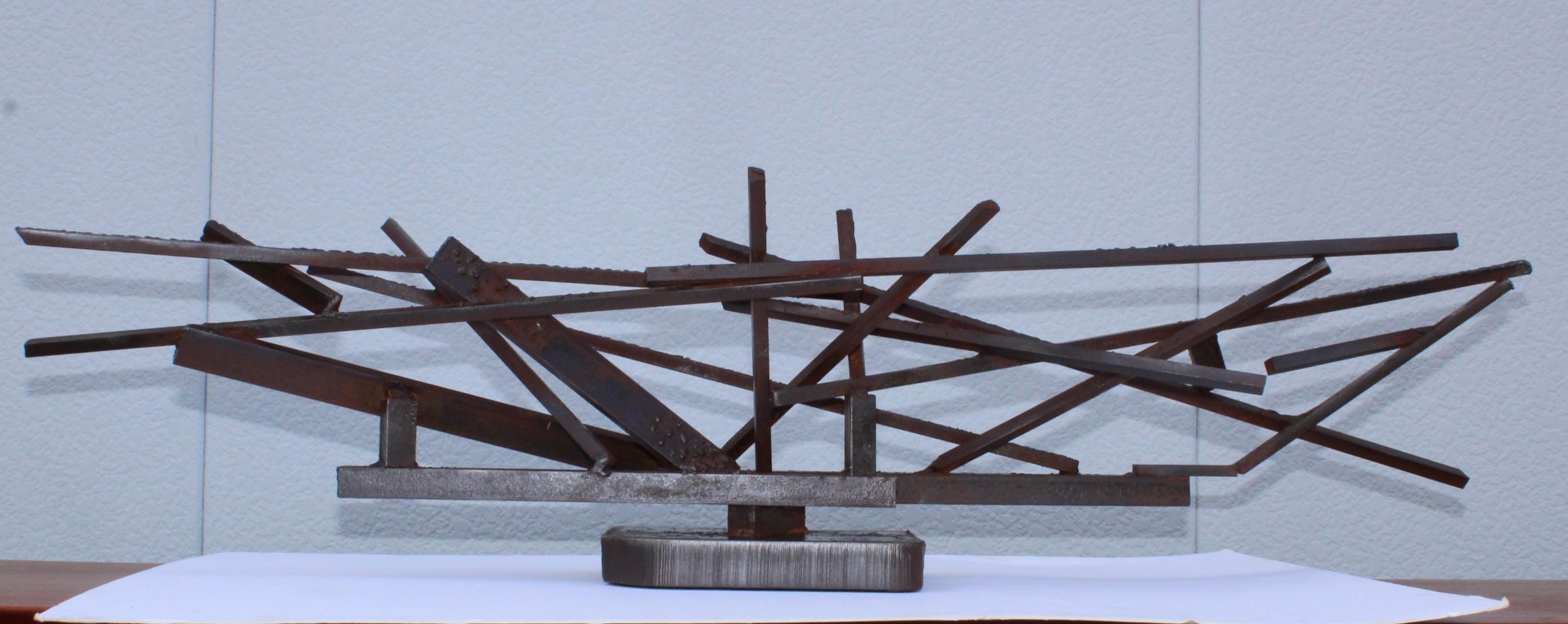 Stunning oversize 1960s welded steel modernist sculpture. In vintage original condition with some wear and patina.