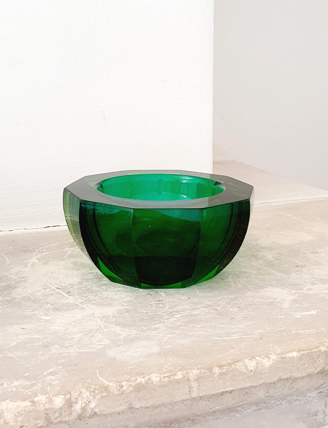Still sporting its original Murano glass sticker on the base, this beautiful deep green large hand-blown bowl is in excellent condition. This deep green is particularly sought over and the size and shape of this piece make it a particularly special