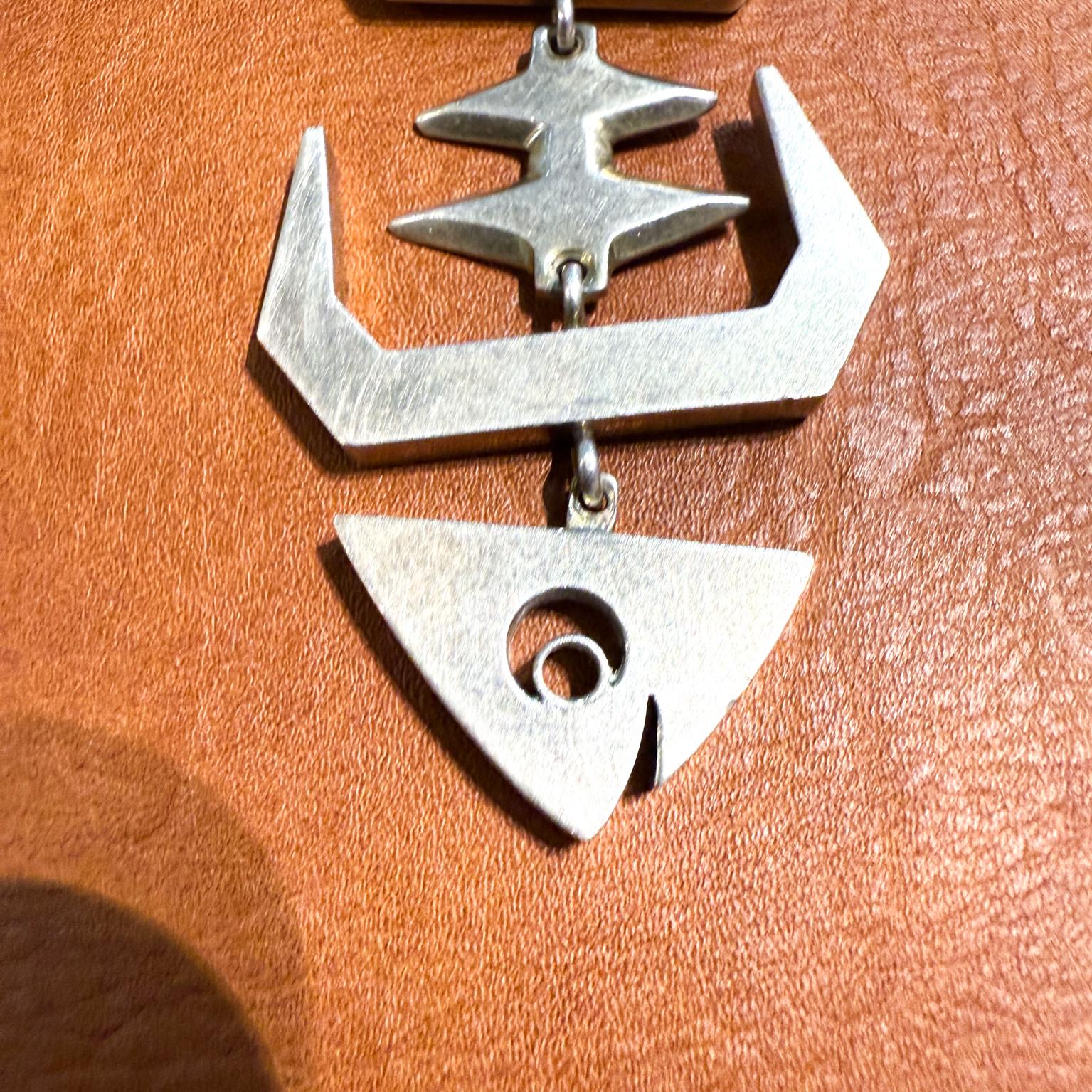 AMBIANIC presents 
1960s Large Sterling Silver Fish Bone Skeleton Pendant
in the style of Salvador Teran
stamped 925 Mexico
3.88 h x 1.5 w
Preowned Condition
Refer to listed images please