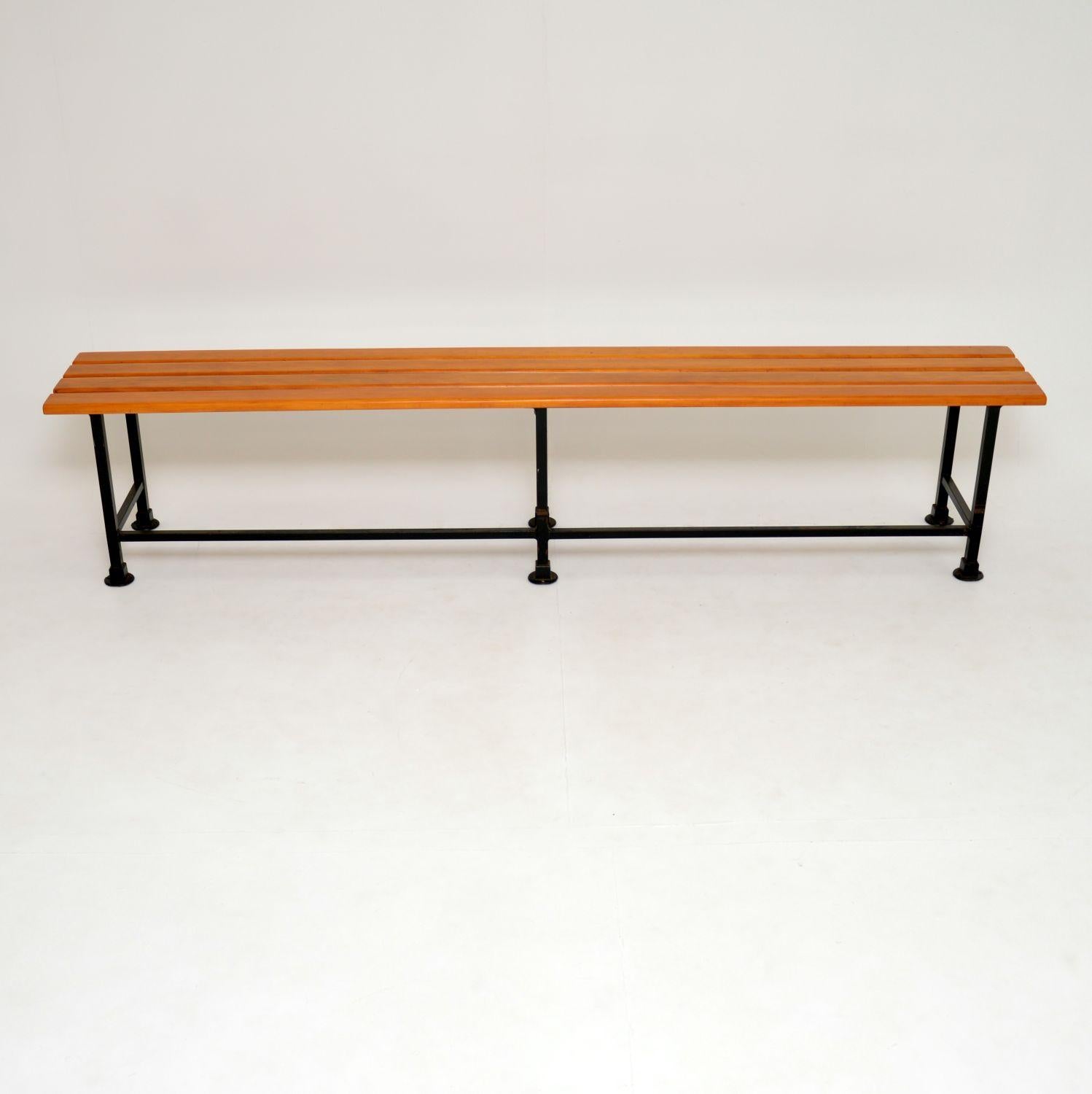 A large and impressive vintage school bench from the 1960s. This is a really nice example, it is of excellent quality and is a great size.

The wood looks like walnut, we have had it stripped and re-polished to a very high standard, it is in
