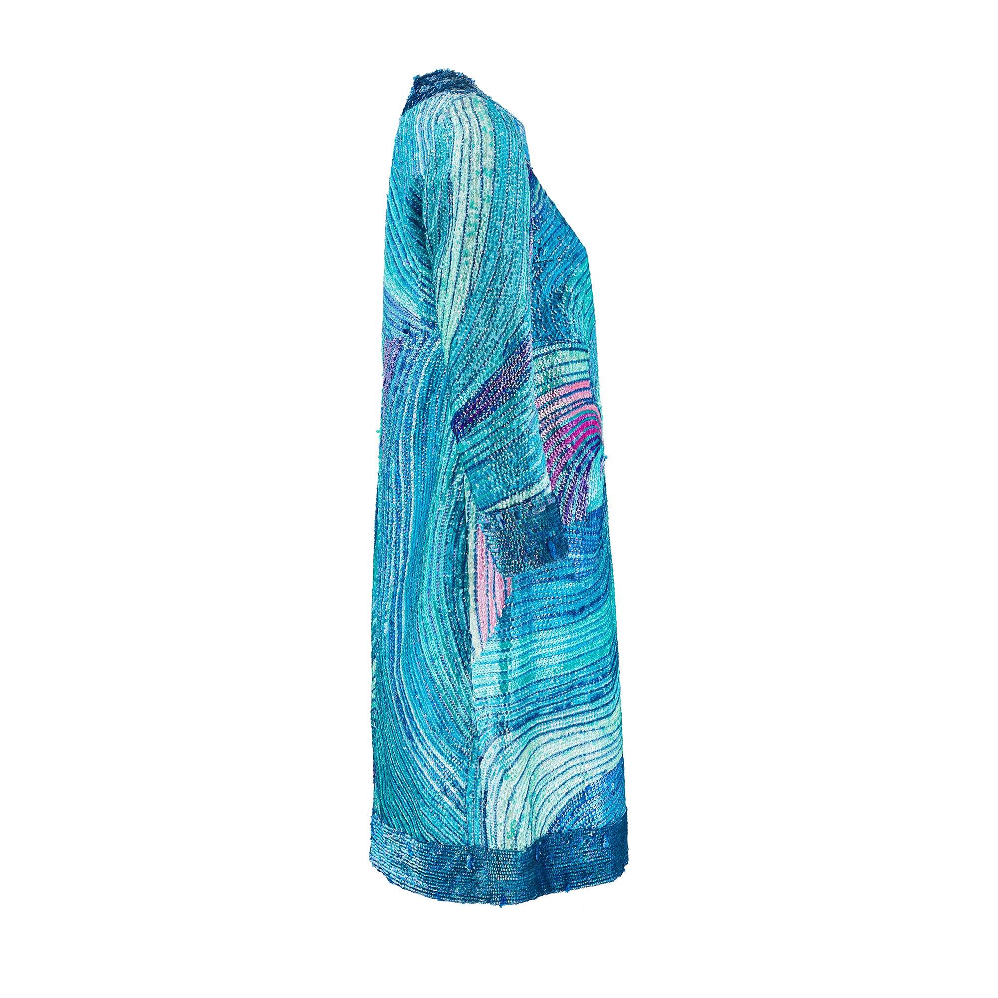 This mesmerising sequinned dress was designed in the late 1960s to early 1970s by Lauretta. Made in Italy using alta moda (haute couture) craftsmanship, it is exquisitely handmade. Cut to a mod-silhouette and falling to below the knee, it has a