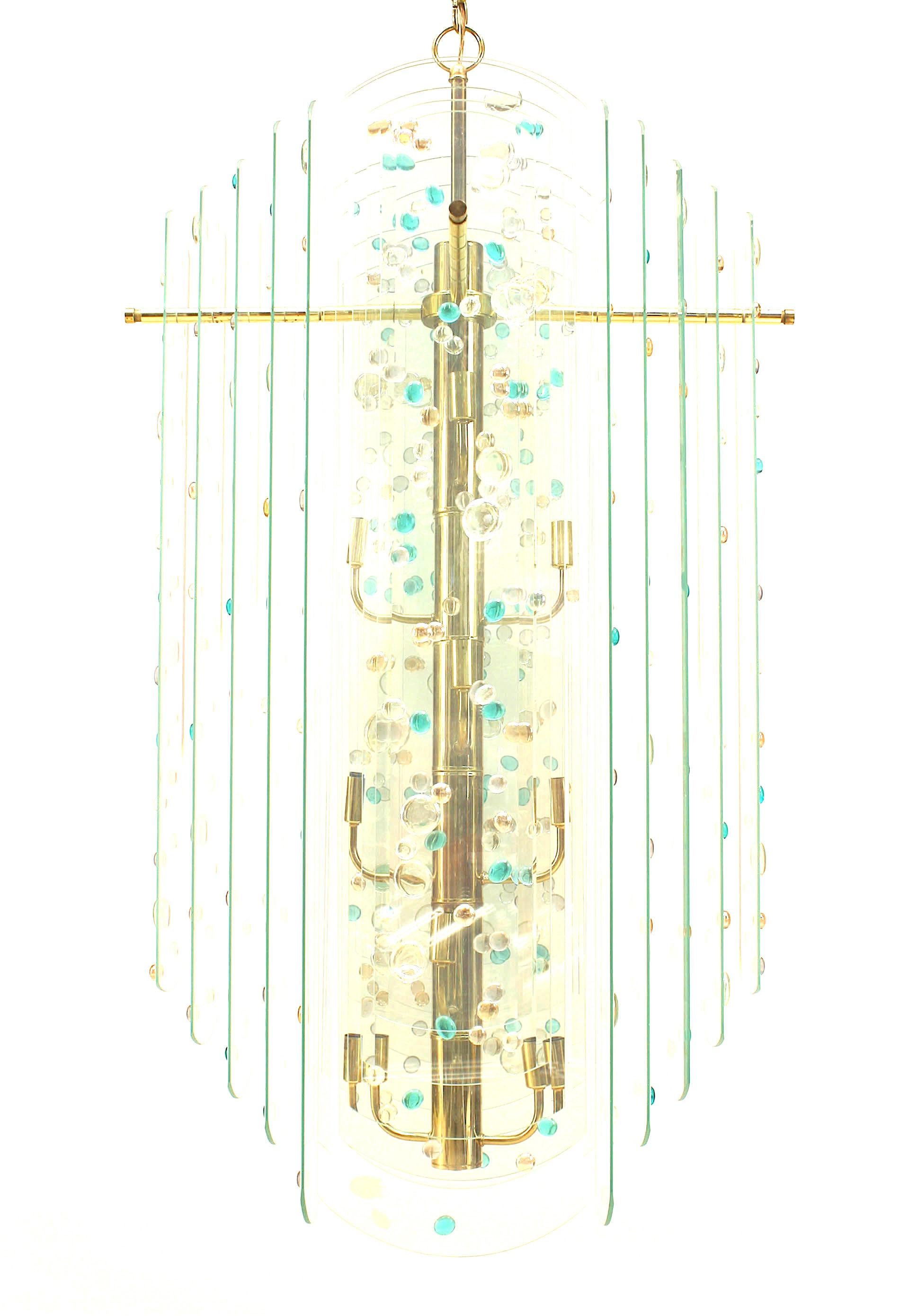 Italian (1960's) glass chandelier with a central brass rod supporting 6 staggered layers of beveled glass decorated with applied colored glass disks (att: FONTANA ARTE)
