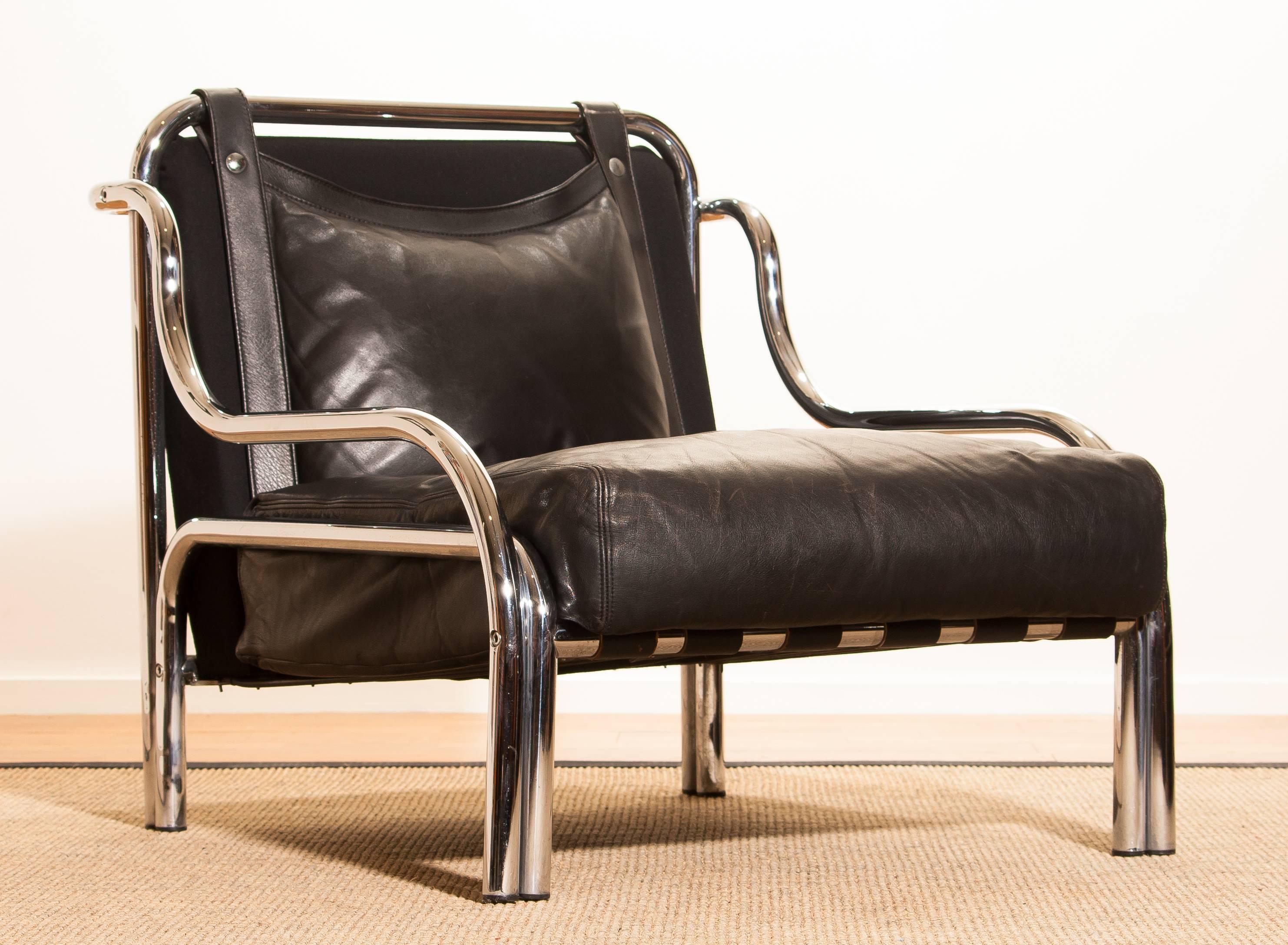 Wonderful lounge chair designed by Gae Aulenti for Poltronova, Italy.
This beautiful chair is made of a black leather seating on a chromed frame.
It is in an excellent condition.
Period 1960s
Dimensions: H. 73 cm, W. 71 cm, D. 80 cm, SH. 30