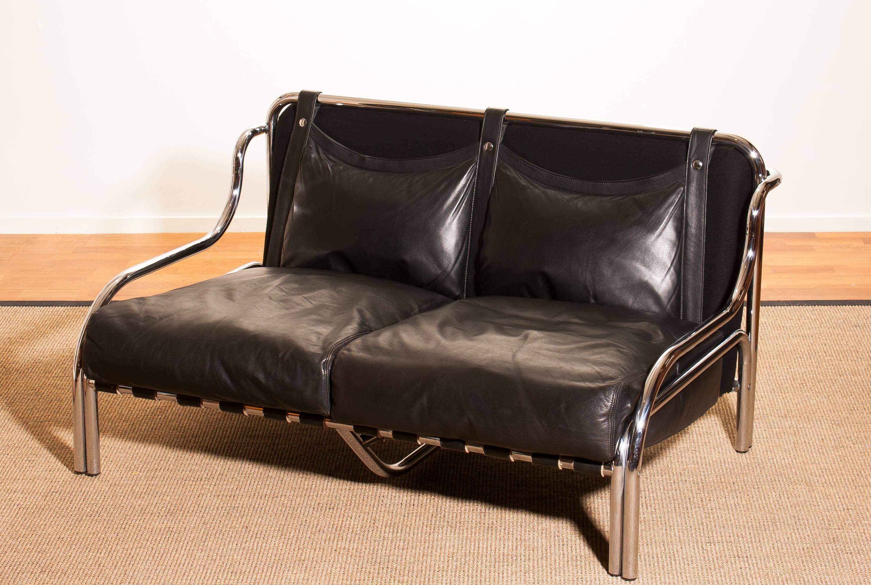 Wonderful lounge sofa designed by Gae Aulenti for Poltronova Italy.
This beautiful sofa is made of a black leather seating on a chromed frame.
It is in an excellent condition.
Period 1960s.
Dimensions: H 73 cm, W 130 cm, D 80 cm, SH 30 cm.
 