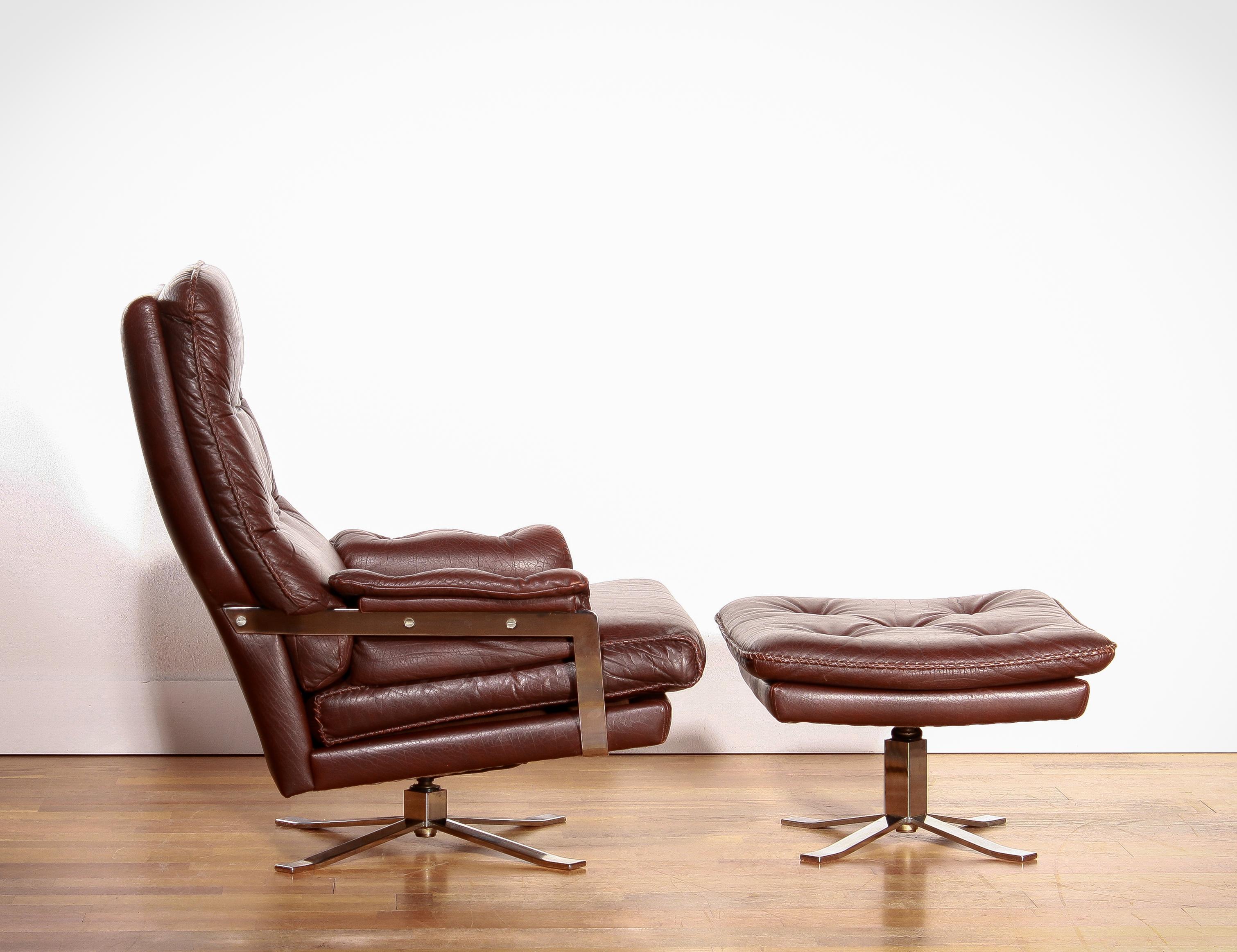 1960s, Leather and Chrome Swivel Lounge Chair and Ottoman by Arne Norell In Good Condition In Silvolde, Gelderland