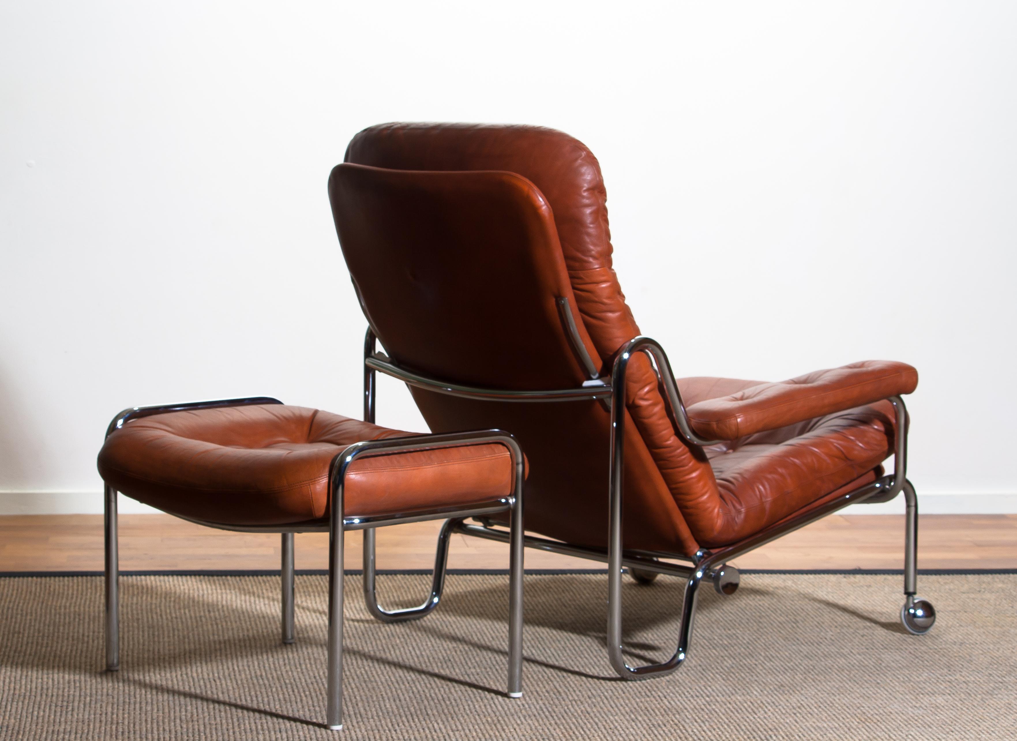European 1960s, Leather and Chrome Tubular Lounge Chair and Ottoman by Göte Möbel