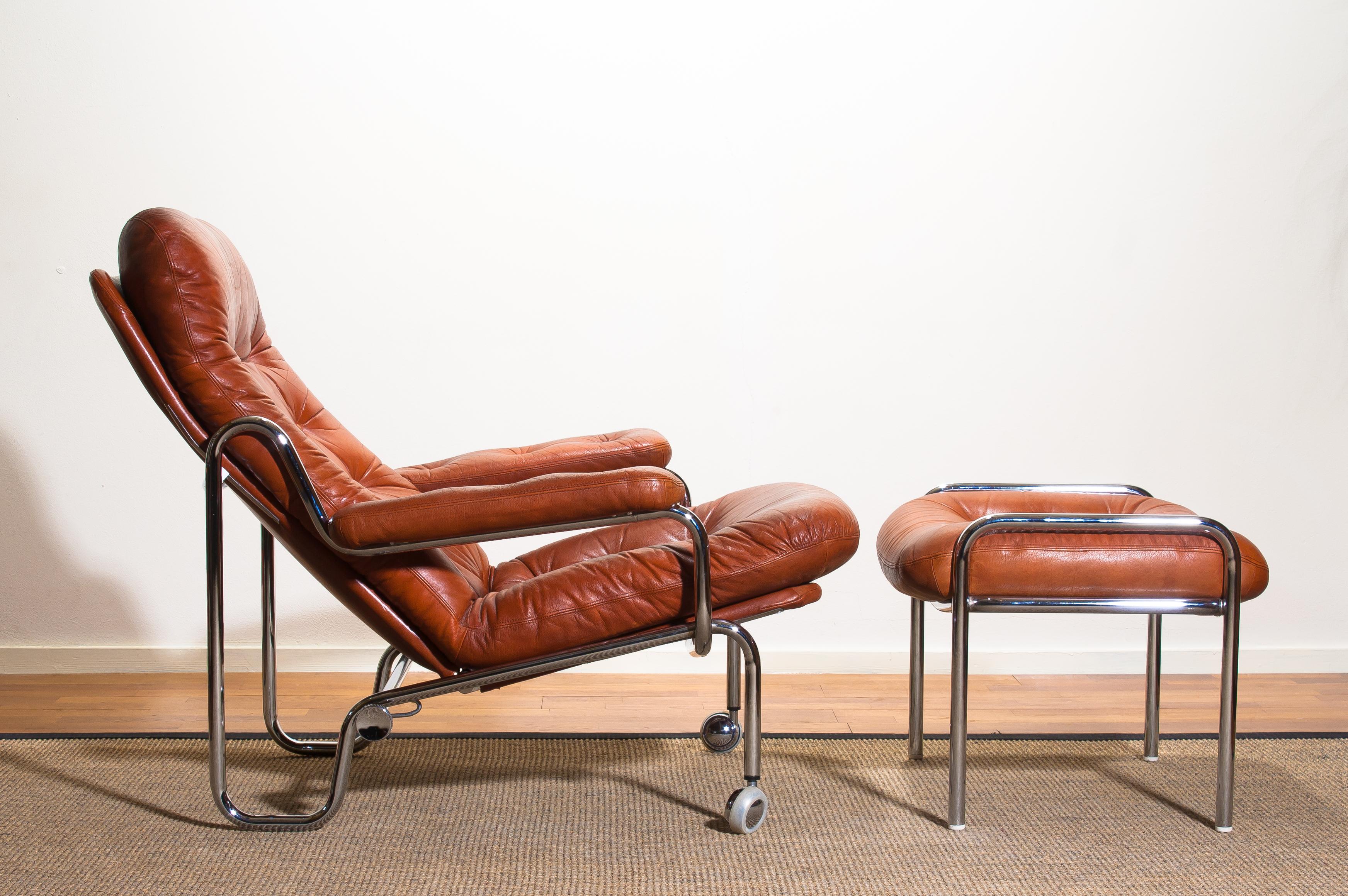 Mid-20th Century 1960s, Leather and Chrome Tubular Lounge Chair and Ottoman by Göte Möbel