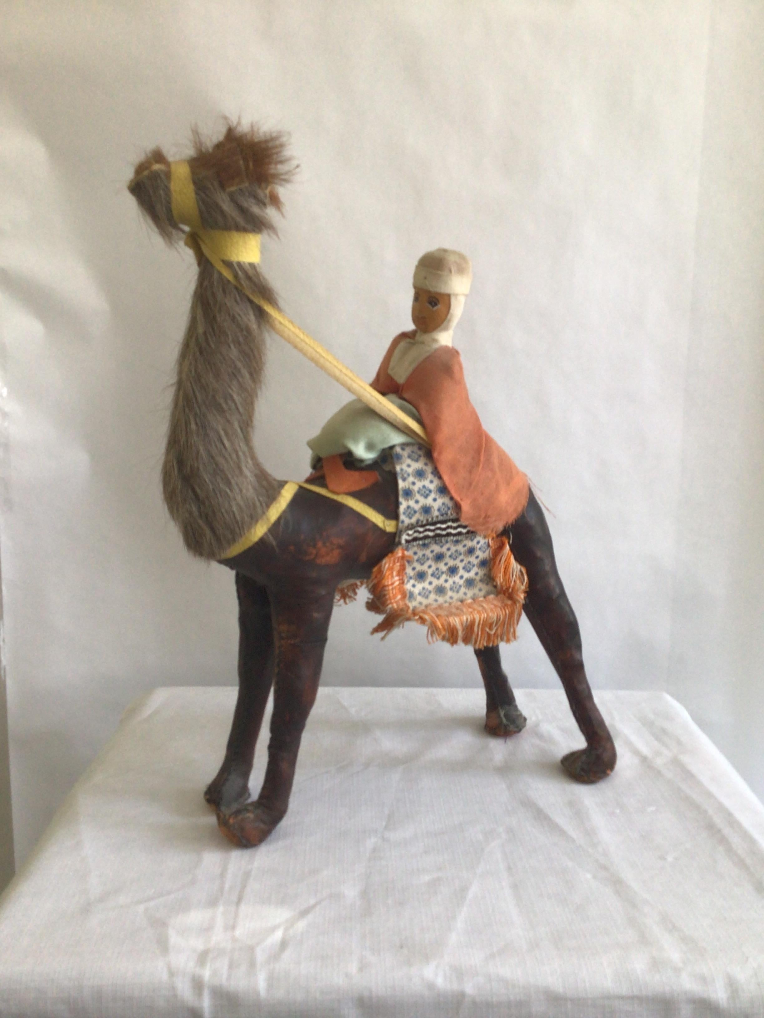 1960s Leather Camel With Rider
Real fur 
Hand-sewn
Beautiful fabric detail and trimming
