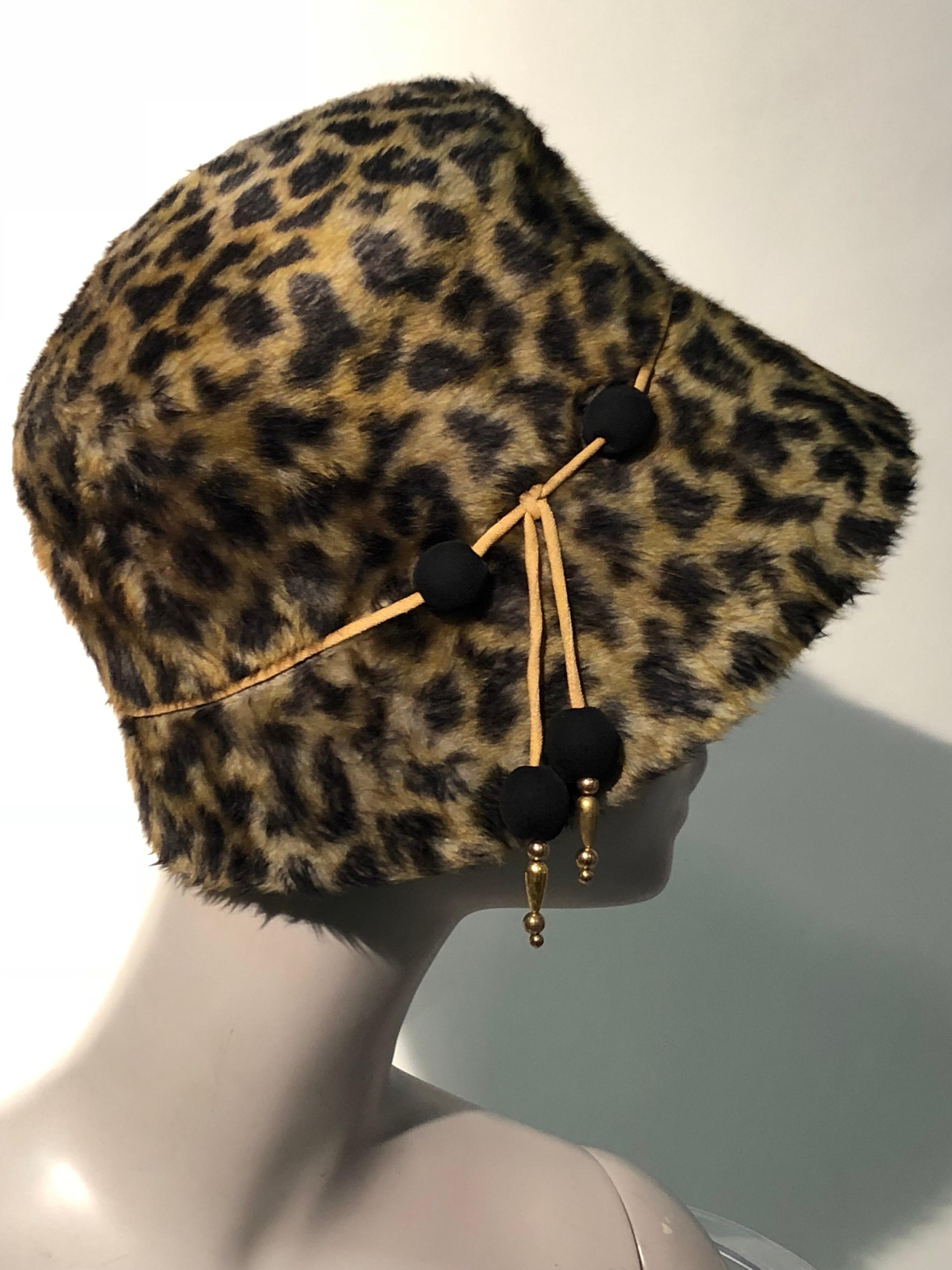 1960s Leslie James leopard print faux fur bucket-style hat W/ unique beaded band of cord, jersey covered and gold beads.
