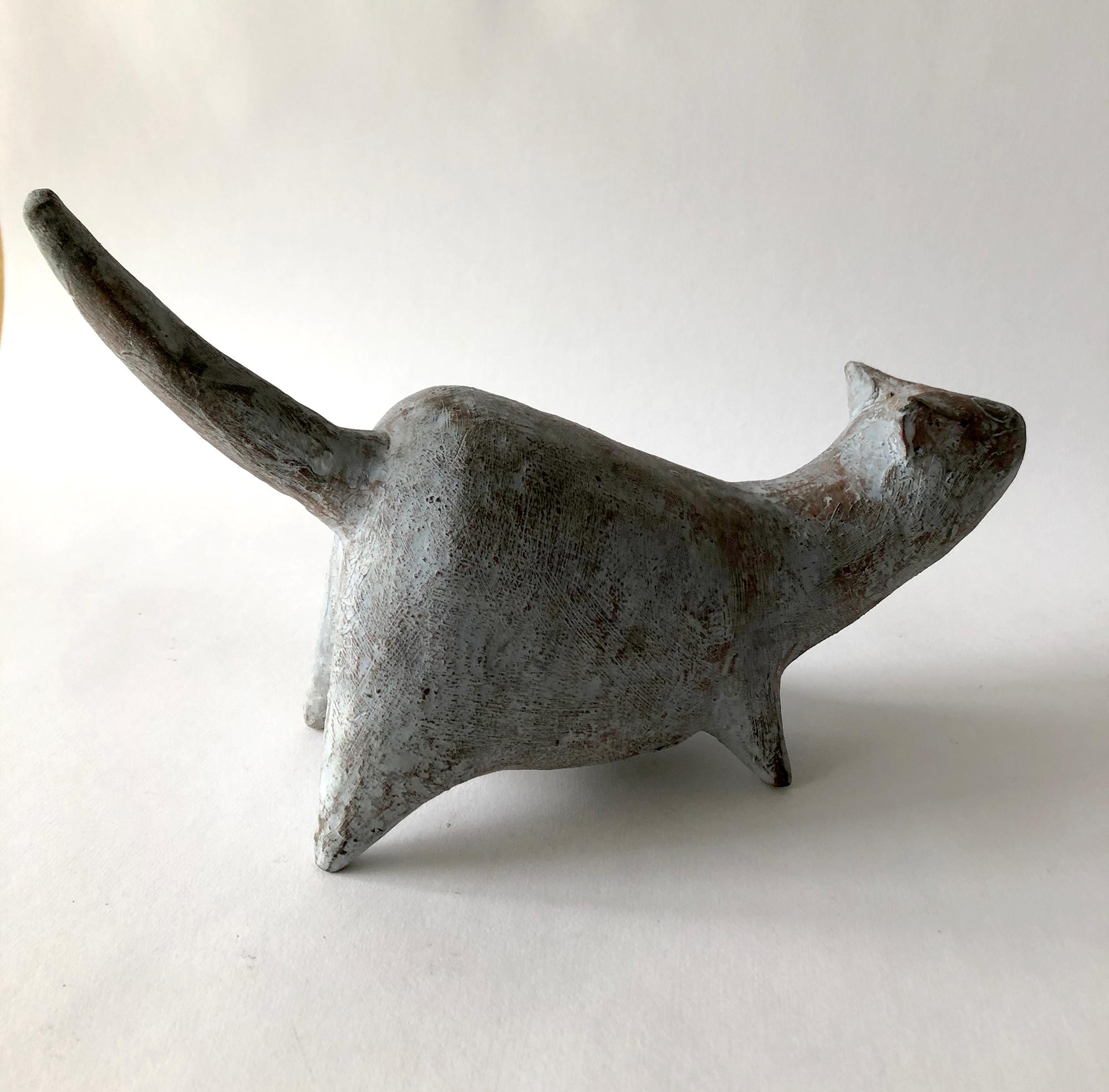 Handmade, one of a kind cat sculpture with cool pale blue glaze over brown stoneware by Leza Sullivan McVey of Cleveland, Ohio. Cat measures: 6.25