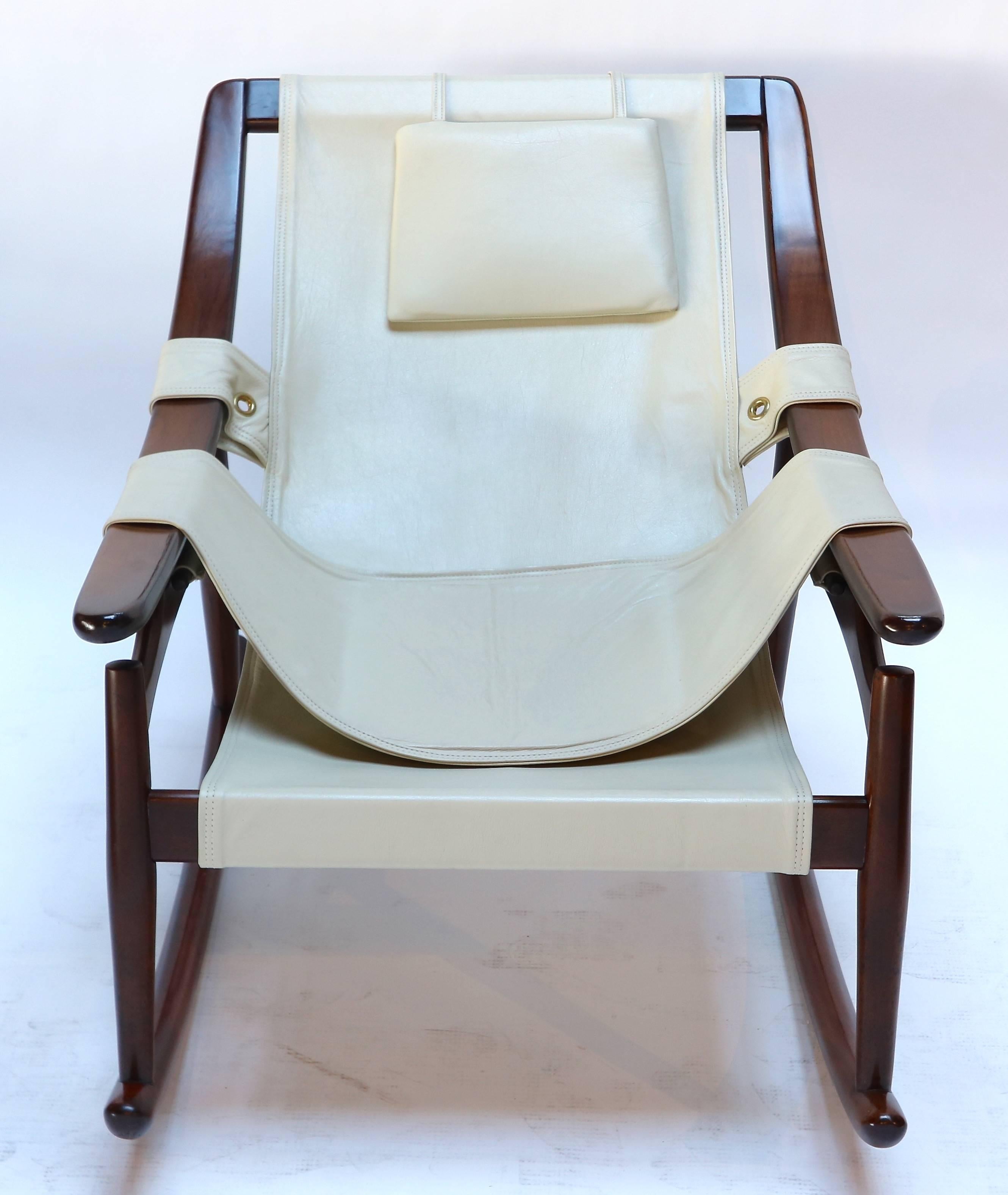 1960s Brazilian jacaranda wood rocking chair upholstered in beige leather by Liceu de Artes e Ofícios, Sao Paulo, Brazil.