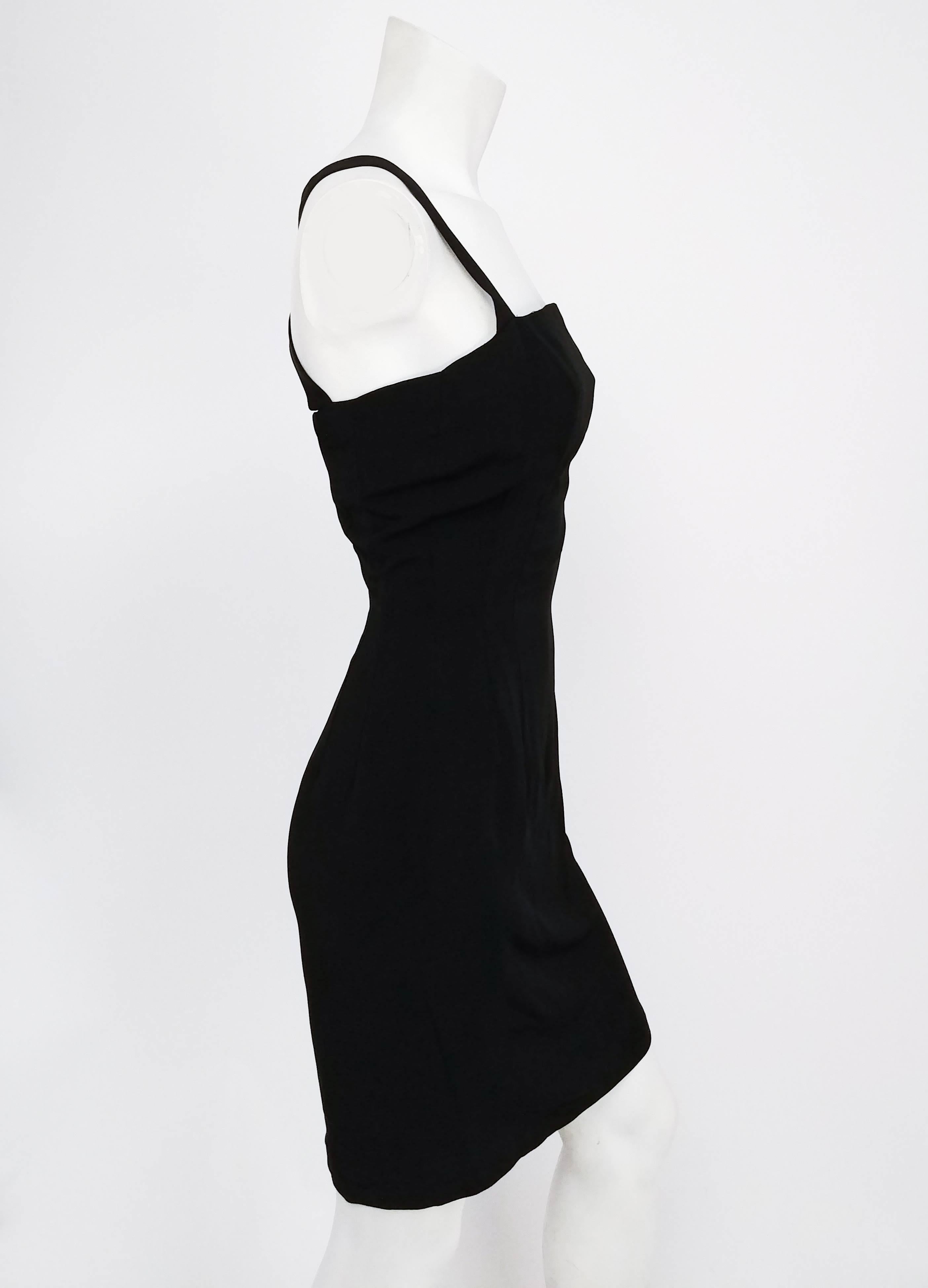 1960s Lilli Ann Black Crossback Cocktail Dress. Square neckline with crossed back strap detail. Mid thigh length. 