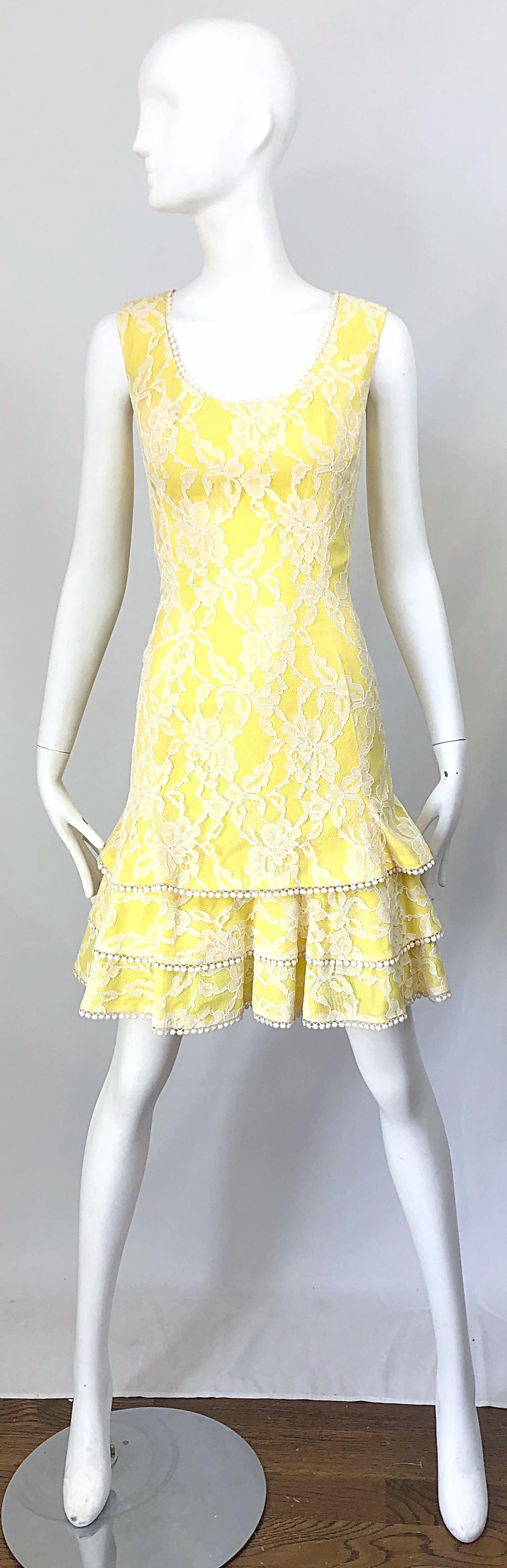 Chic 1960s LILLI DIAMOND canary yellow and white silk lace dress! Features a fitted bodice with a ruffled skirt. White pom poms at the collar and each tier of ruffles. Hidden zipper up the back with hook-and-eye closure. Great for any day or evening