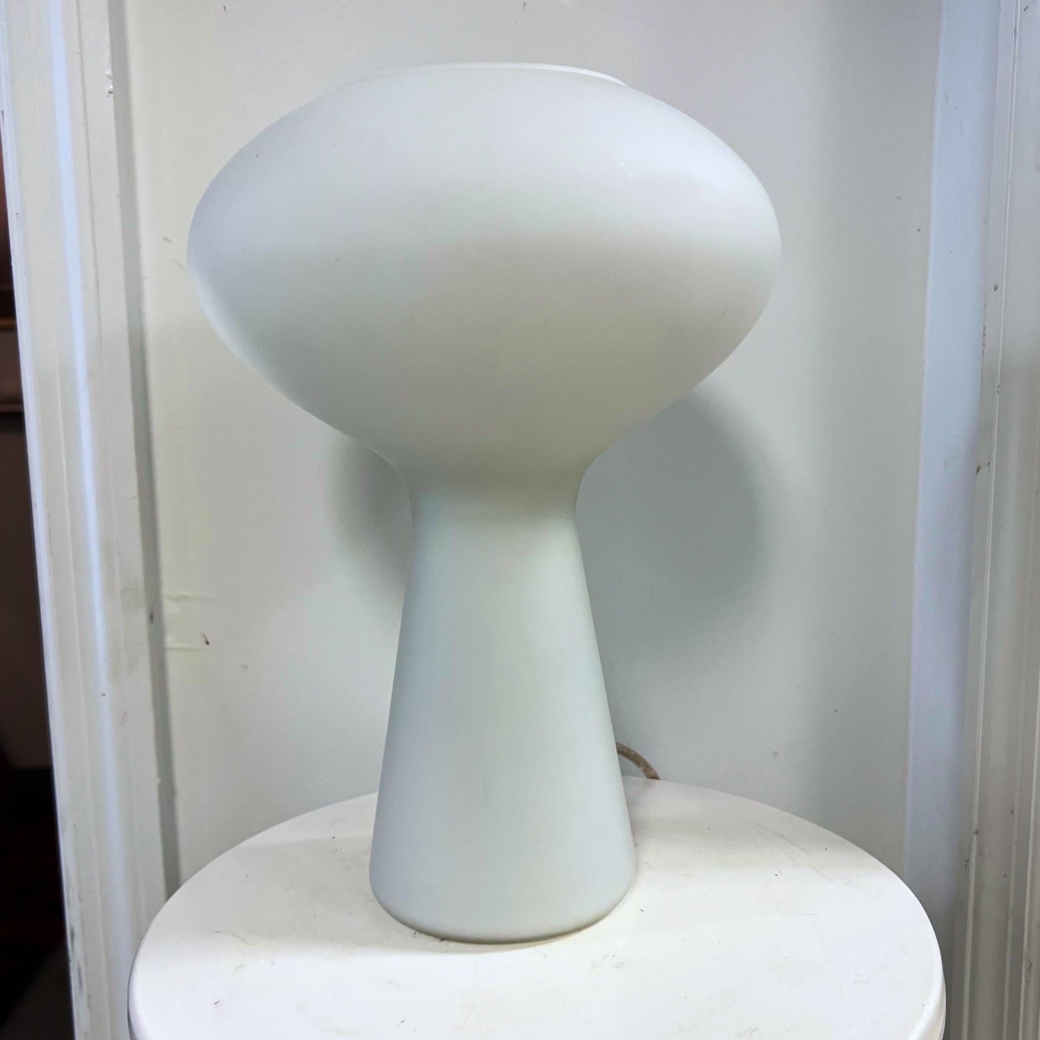 Organic modern table lamp, designed by Lisa Johansson-Pape. Handblown glass is shaped in a pleasing yet playful mushroom form. Lovely opaline quality to the glass. A stunning table lamp designed by Lisa Johansson-Pape of Finland in 1960. Beautiful