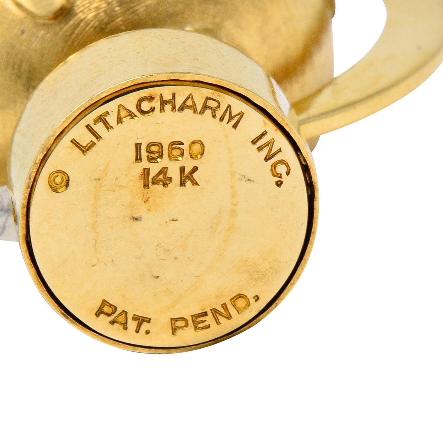 1960s Litacharm Inc. Vintage 14 Karat Yellow Gold Globe Pendant Charm In Excellent Condition In Philadelphia, PA