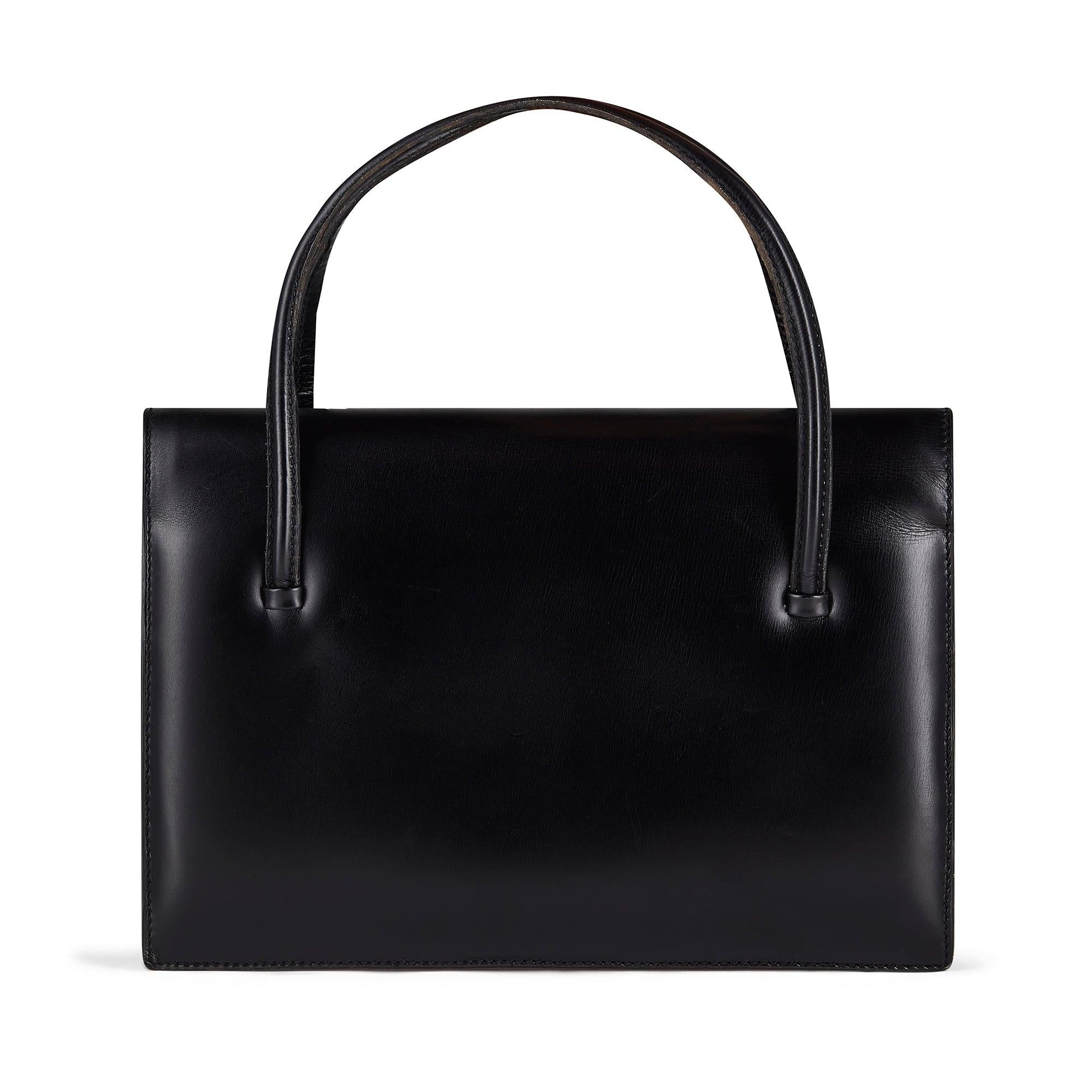 This fine and rare handbag was designed by Spanish luxury fashion house Loewe in the 1960s. Loewe was established in Madrid in 1846 and specialised in leather goods almost exclusively for Spanish royalty and the aristocracy which helped establish