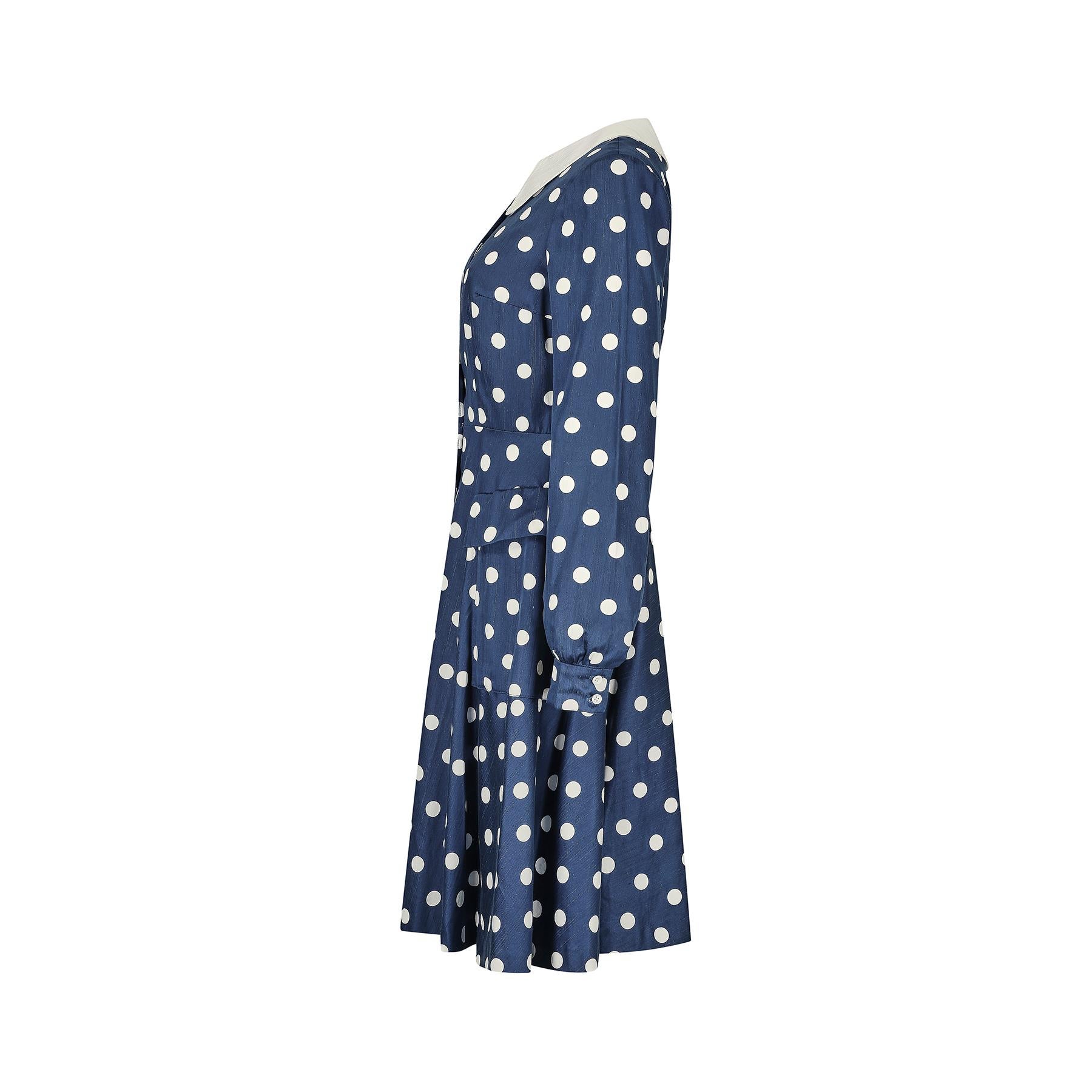 1960s French blue and white polka dot Louis Feraud for Rembrandt mod style dress.  The fabric is probably a cotton or blend and of excellent quality. A classic shirtwaister design featuring a stiffened Peter Pan collar and the central button stand