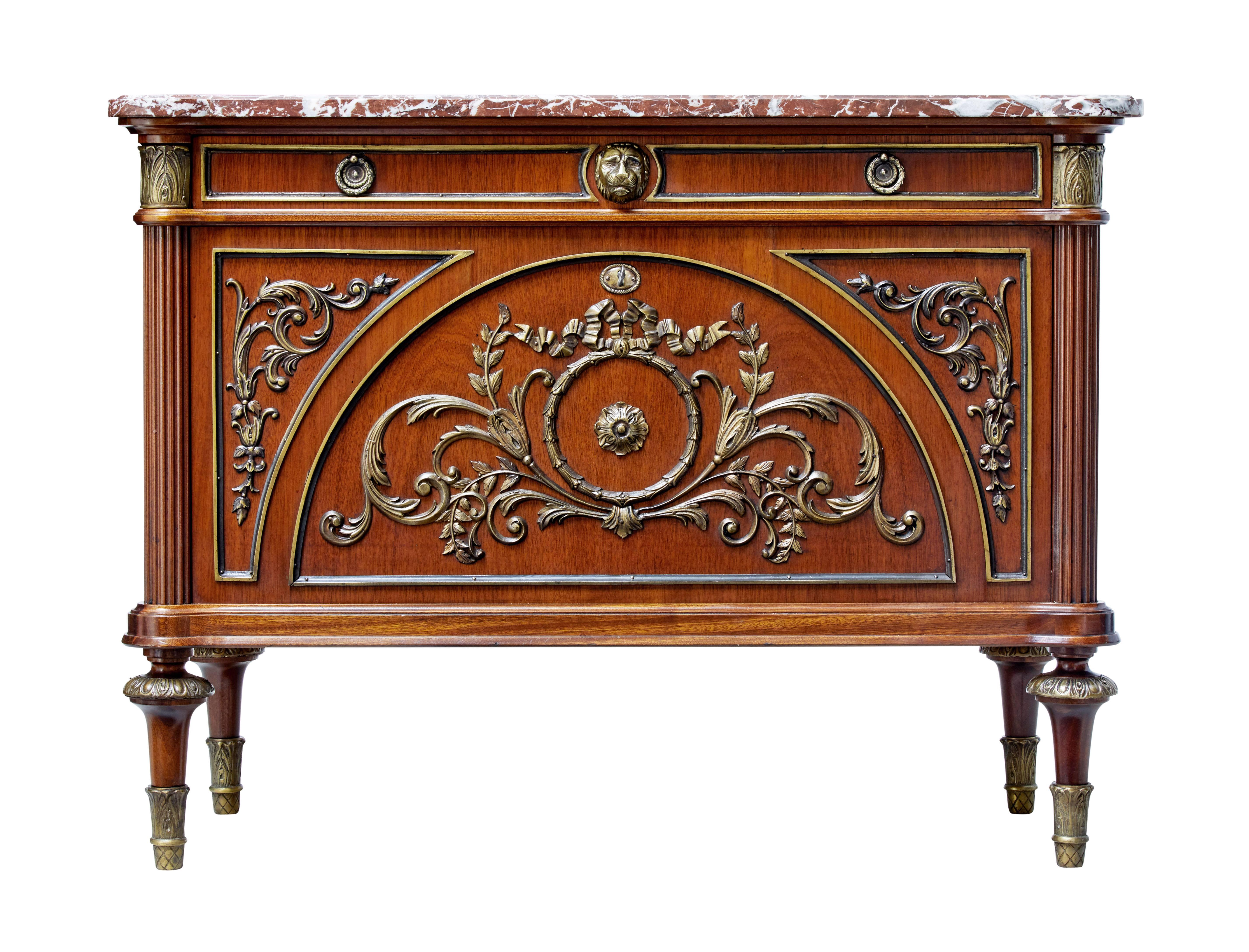 Fine quality 1960s ormolu, mahogany and marble top commode.

Single drawer with drop down front to reveal a further two fitted drawers.

Beautifully applied ormolu and brass decoration. Fluted columns to the sides.

Marble top is loose fitting