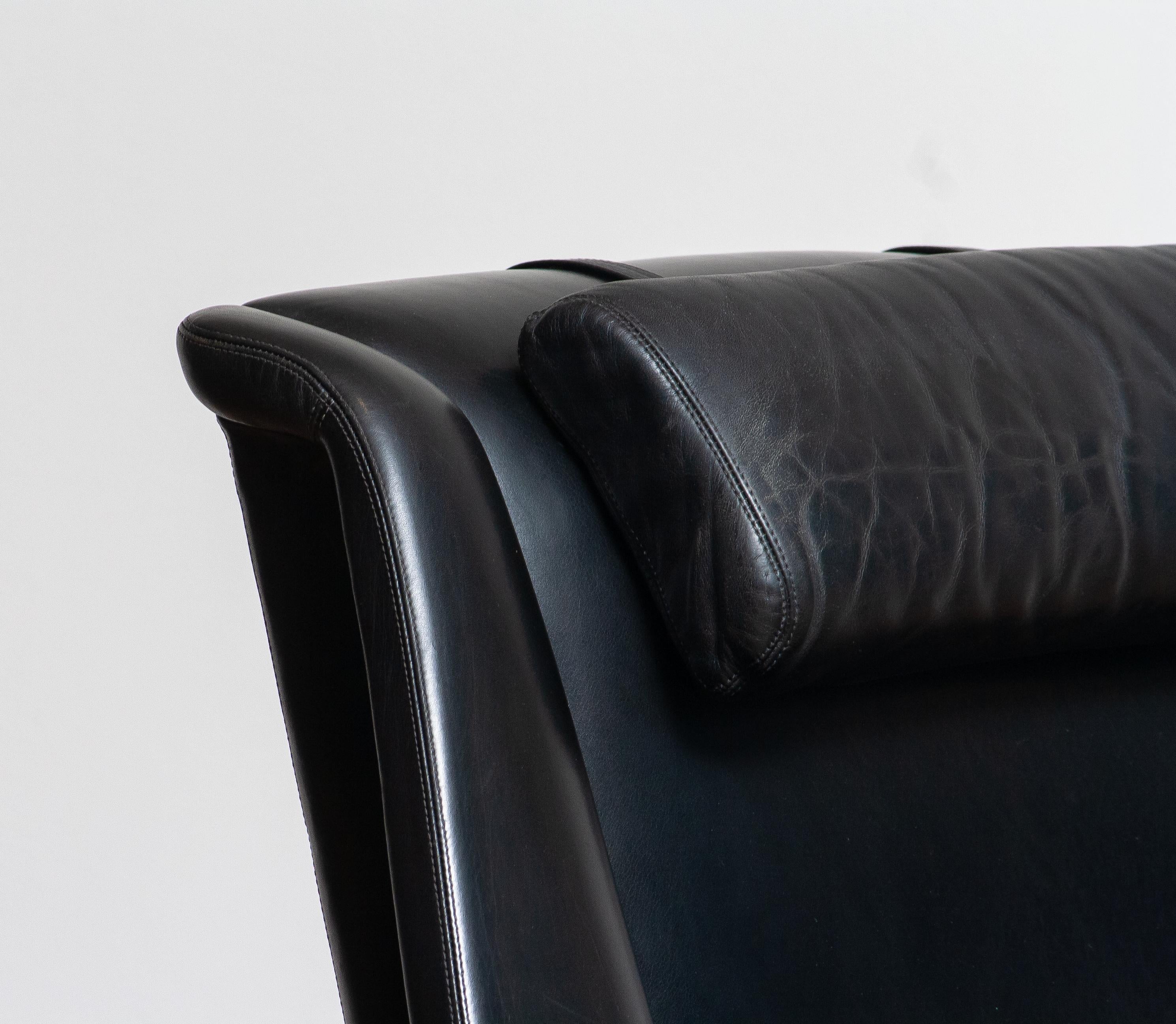 Mid-20th Century 1960s, Lounge Chair Profil by Folke Ohlsson for DUX in Black Leather and Teak
