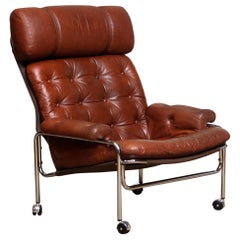 1960s Lounge / Easy Chair in Chrome and Aged Brown  Cognac Leather by Lindlöfs 1