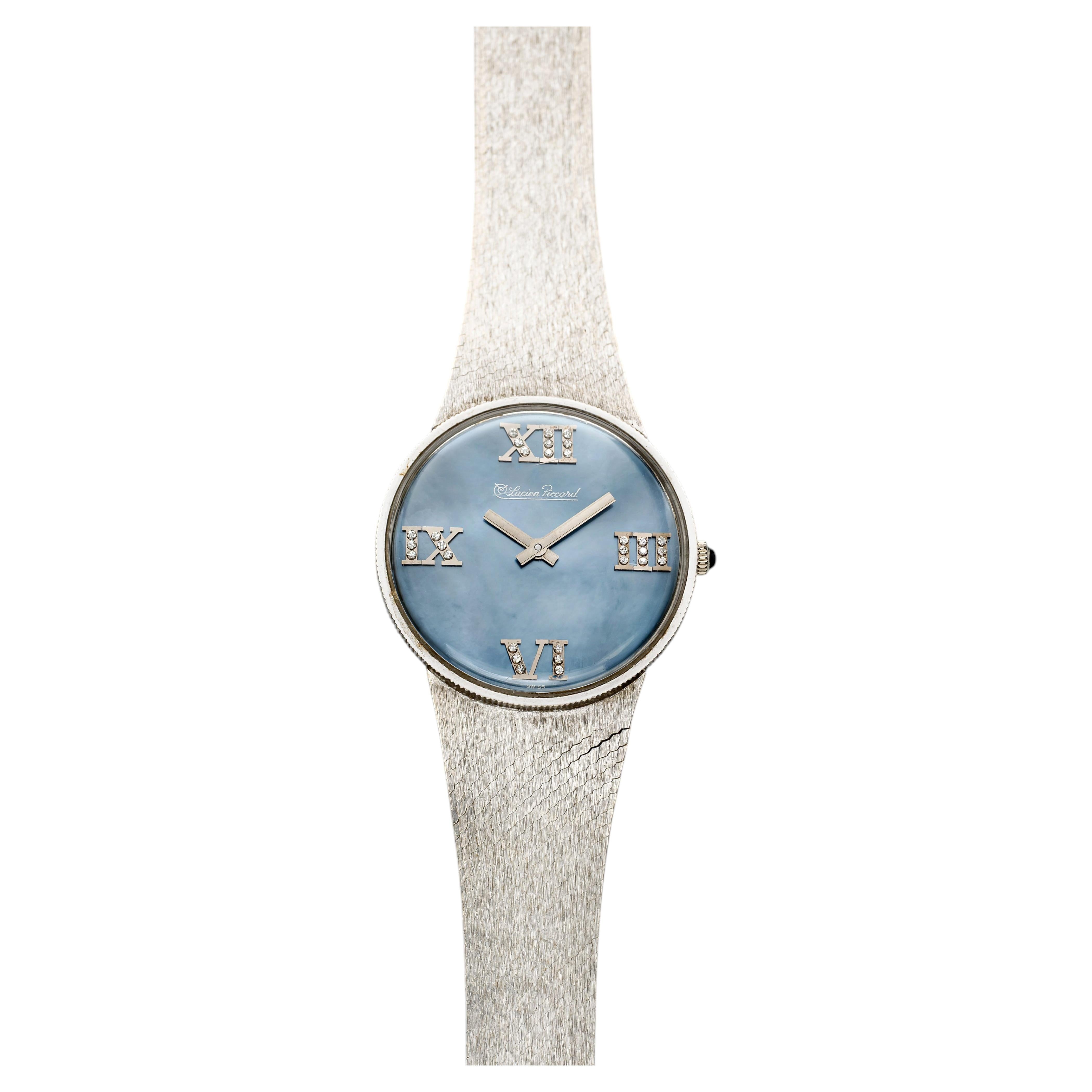 How do you open a Lucien Piccard watch?