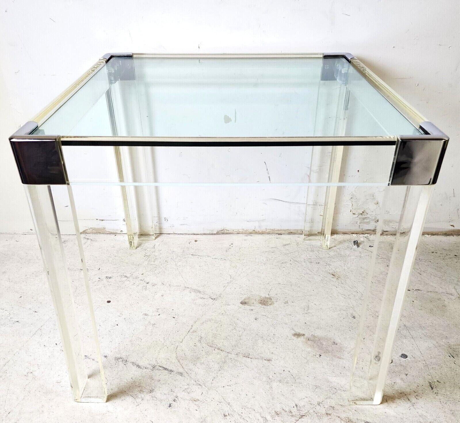 Offering one of our recent palm beach estate fine furniture acquisitions of a
vintage 1960s lucite & solid chrome Charles Hollis Jones style dining game table.

We have many other similar tables listed including a Vintage MCM LUCITE ACRYLIC 3 PRONG