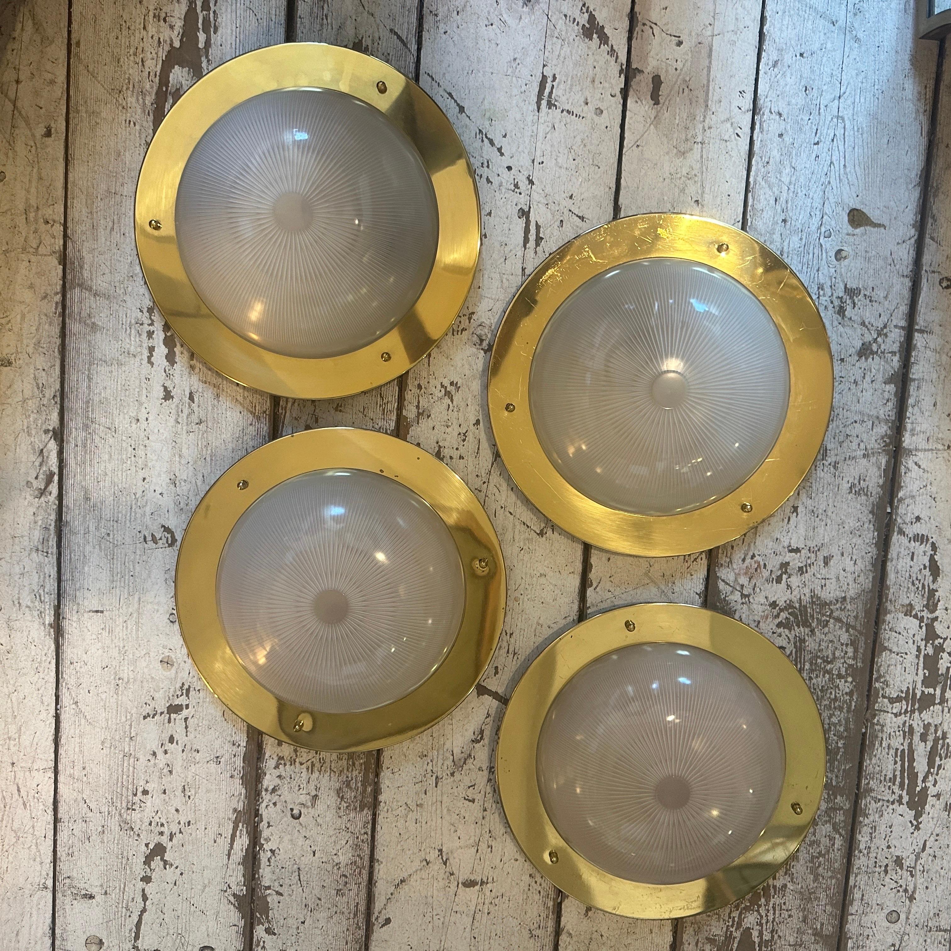 A lot of high-quality Mid-Century Modern brass and Fidenza glass ceiling lights, also usable as a wall light in the manner of Luigi Caccia Dominioni. It has been manufactured in Italy in the Seventies, and it's in perfect condition. It works with