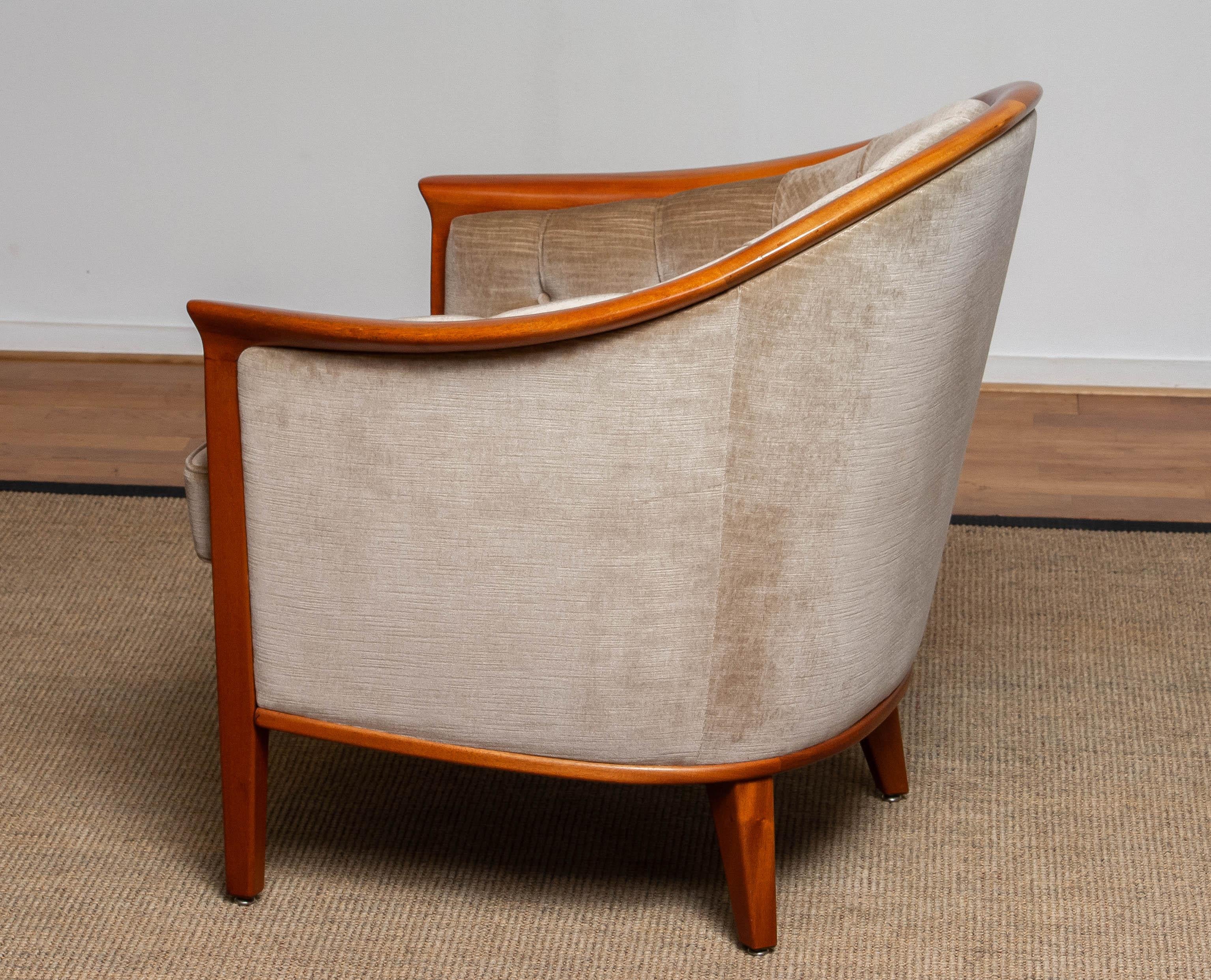 Mid-20th Century 1960s Mahogany and Taupe Velvet Lounge Chair by Broderna Andersson Sweden