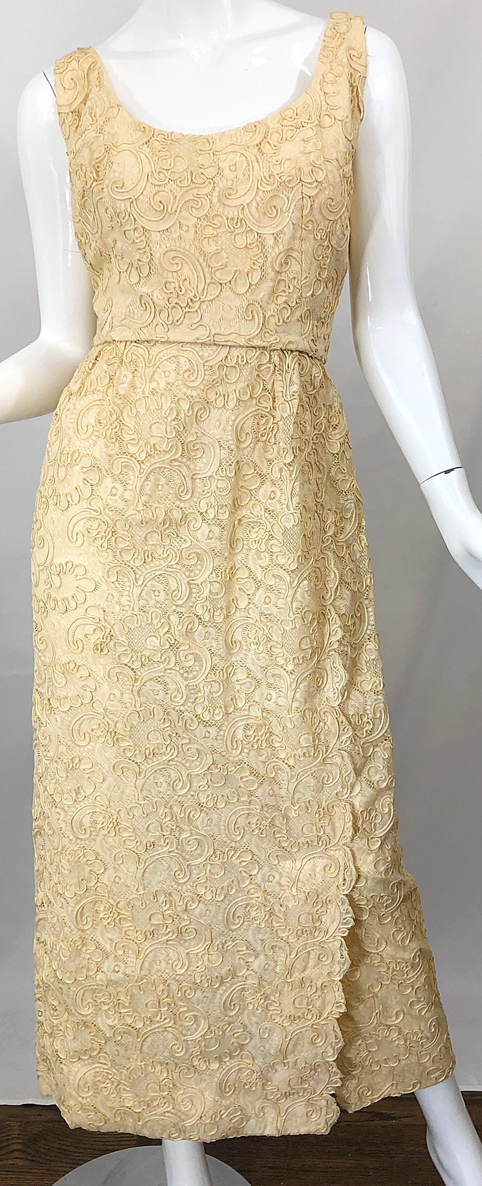 Beautiful vintage 1960s MALCOLM STARR pale light yellow silk lace embroidered sleeveless gown / maxi dress! Features intricately embroidered lace throughout. Tailored bodice with a generous fuller skirt. Chic velvet strap and bow detail at back