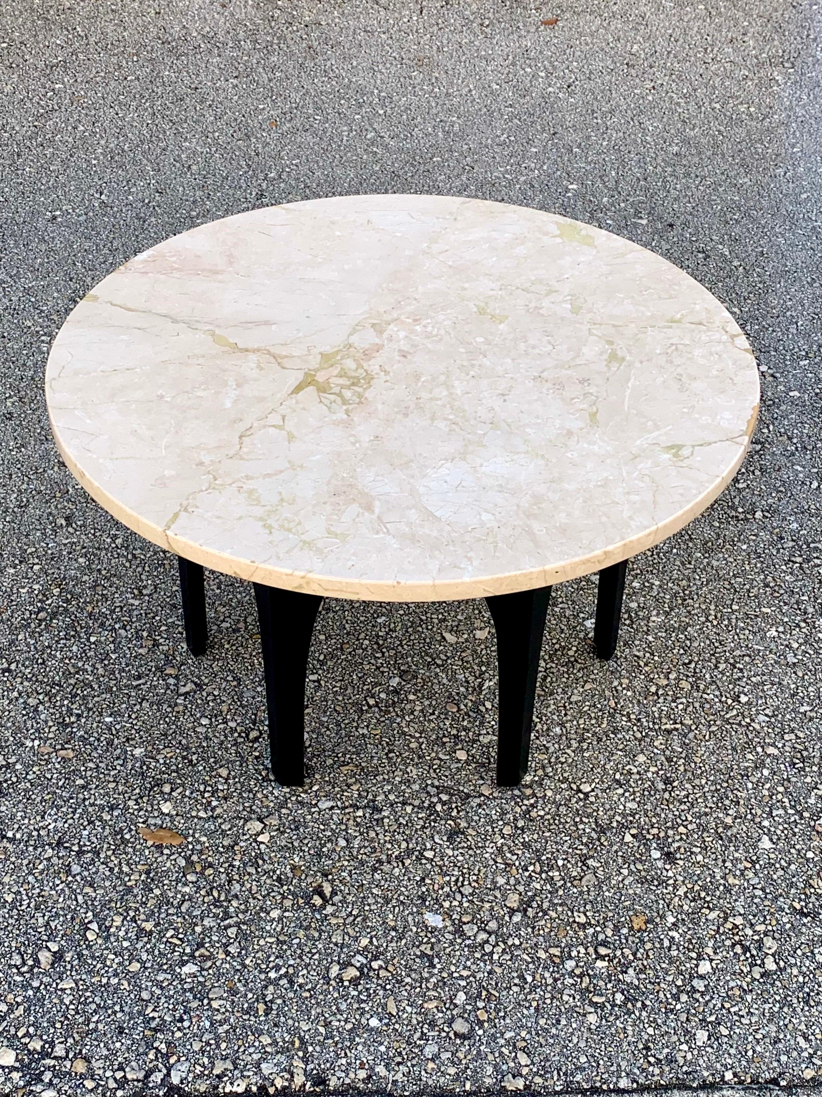 1960s coffee table by Harvey Probber. Two piece construction with the marble table top sitting on a base. A hexagon of wood with arches support the top. The base is engineered to be in this orientation but you could easily flip the base upside down