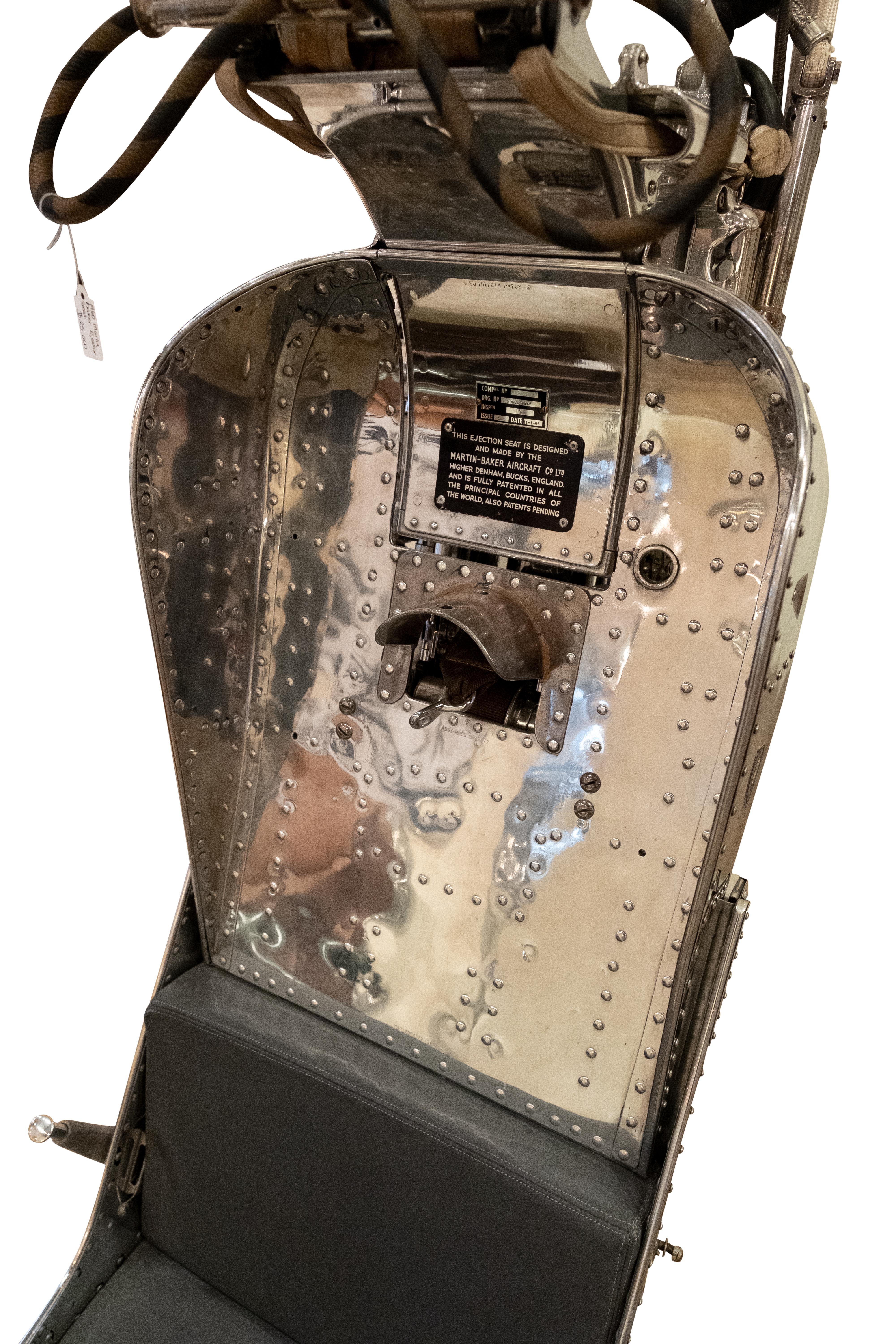 This ejection seat is not just any ejection seat, but it is a Martin Baker ejection seat, which is one of the most widely respected brands of pilot safety. This specific ejection seat was used in an F4 Phantom Fighter Jet which served during the