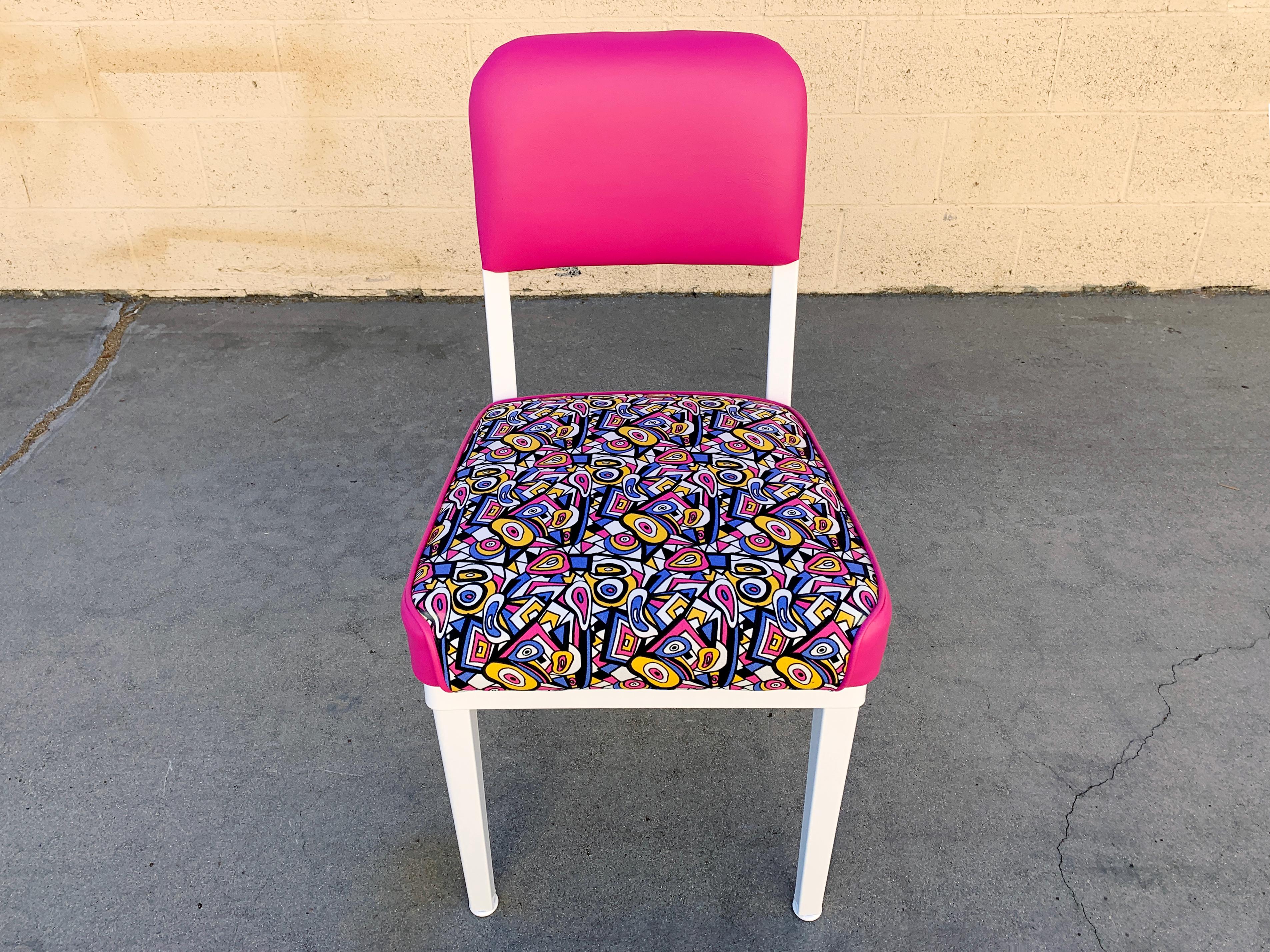 Super cute 1960s McDowell Craig steel side chair, totally refinished. We painted the frame in a gloss white powder coat and upholstered the seat in a retro style op-art fabric with pink vinyl backrest and cushion sides. It's groovy baby! Excellent