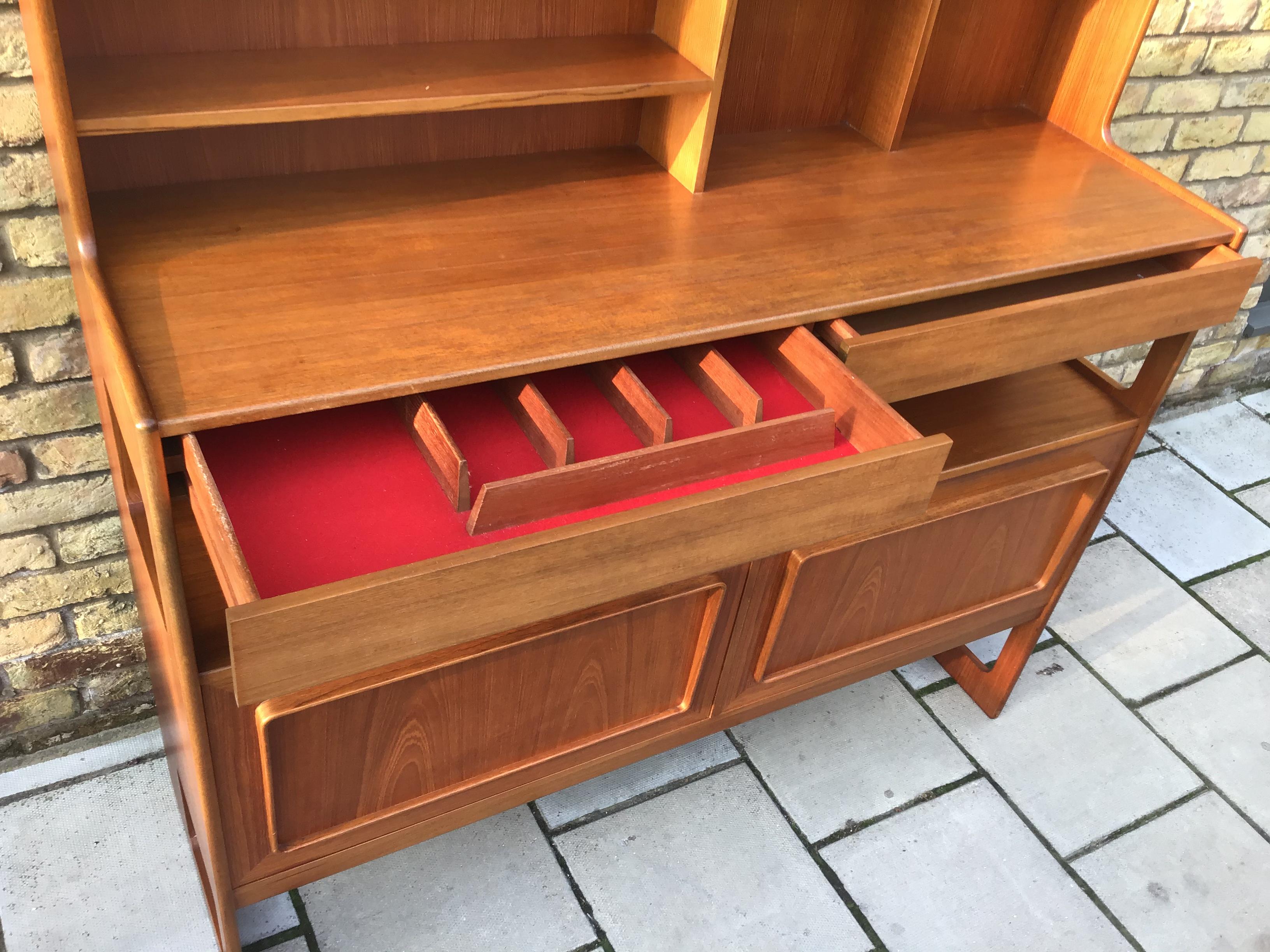 McIntosh teak Forfar sideboard introduced in 1969.

 

The Forfar and Fife sideboards were related designs with the same panelled detailing and cut out sides.

As it was so much more expensive than other McIntosh sideboards and those of their