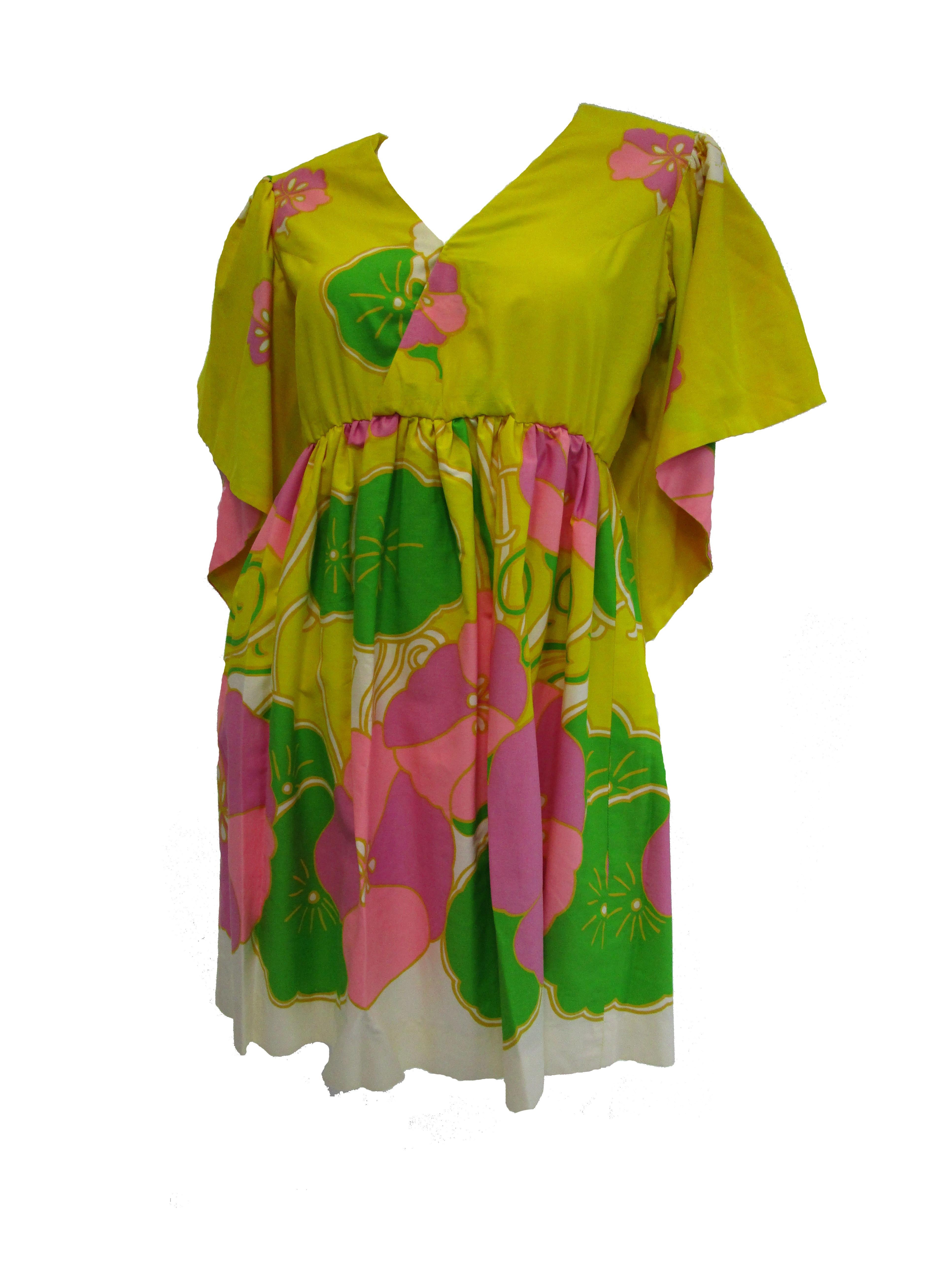 Resort wear season... here we come.....

Flirty, bright and vivid 60's dress by Mel Mortman. Waterfall sleeves add style to this dress. Featuring an empire waist and v-neck. Wear as a cover up at the pool or to the Saturday market with a straw hat.