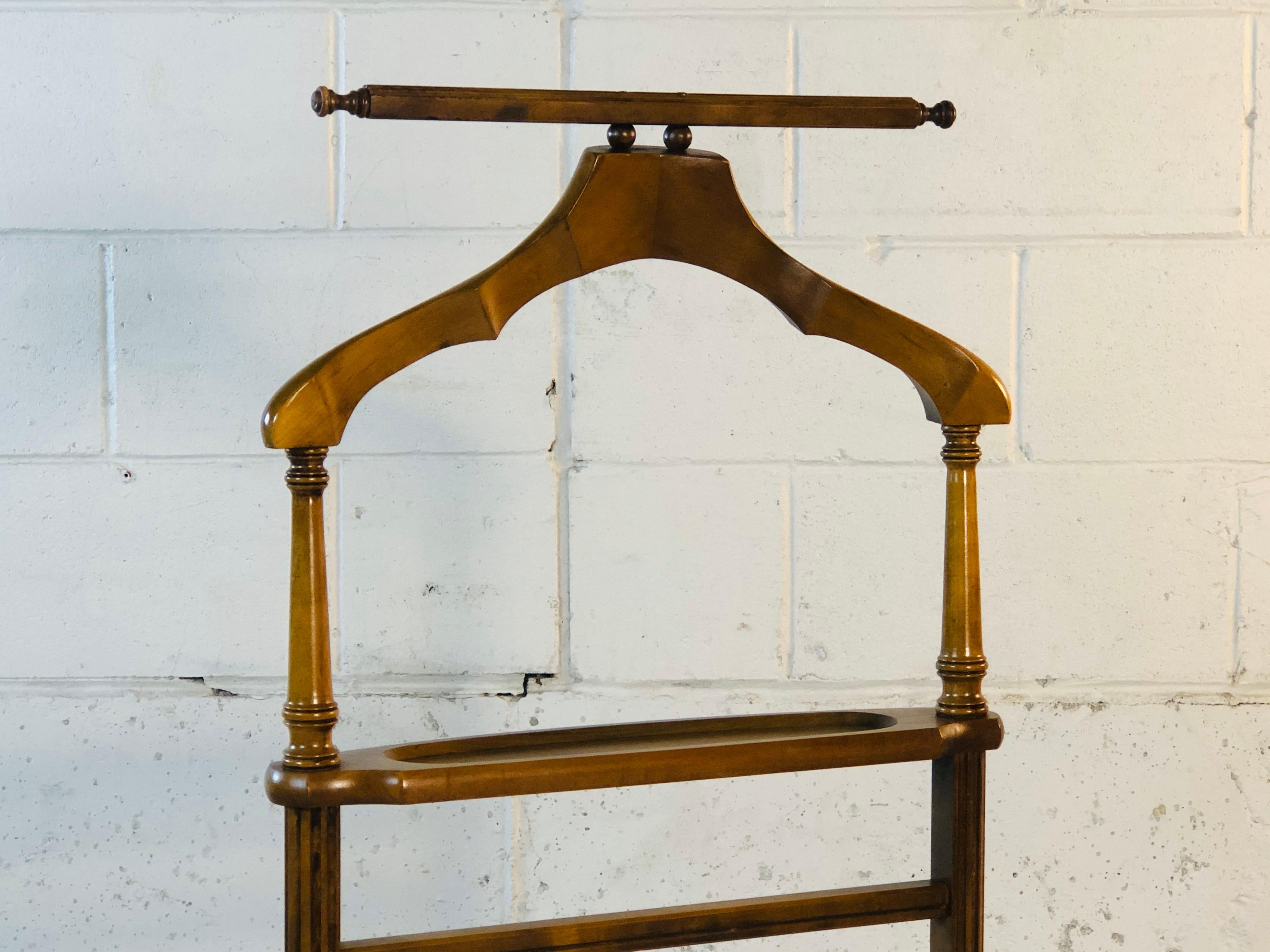 Vintage 1960s wood men’s bedroom valet Stand. The valet has been newly refinished. No marks.