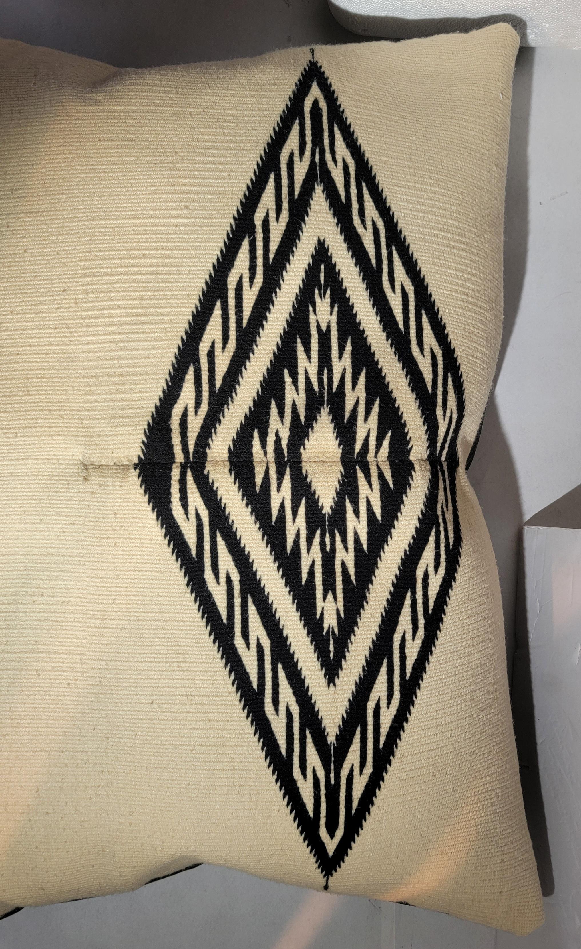 Large Hand made Mexican Indian Weaving pillow with black linen backing. 
Wonderful large sized woven wool pillow that states 