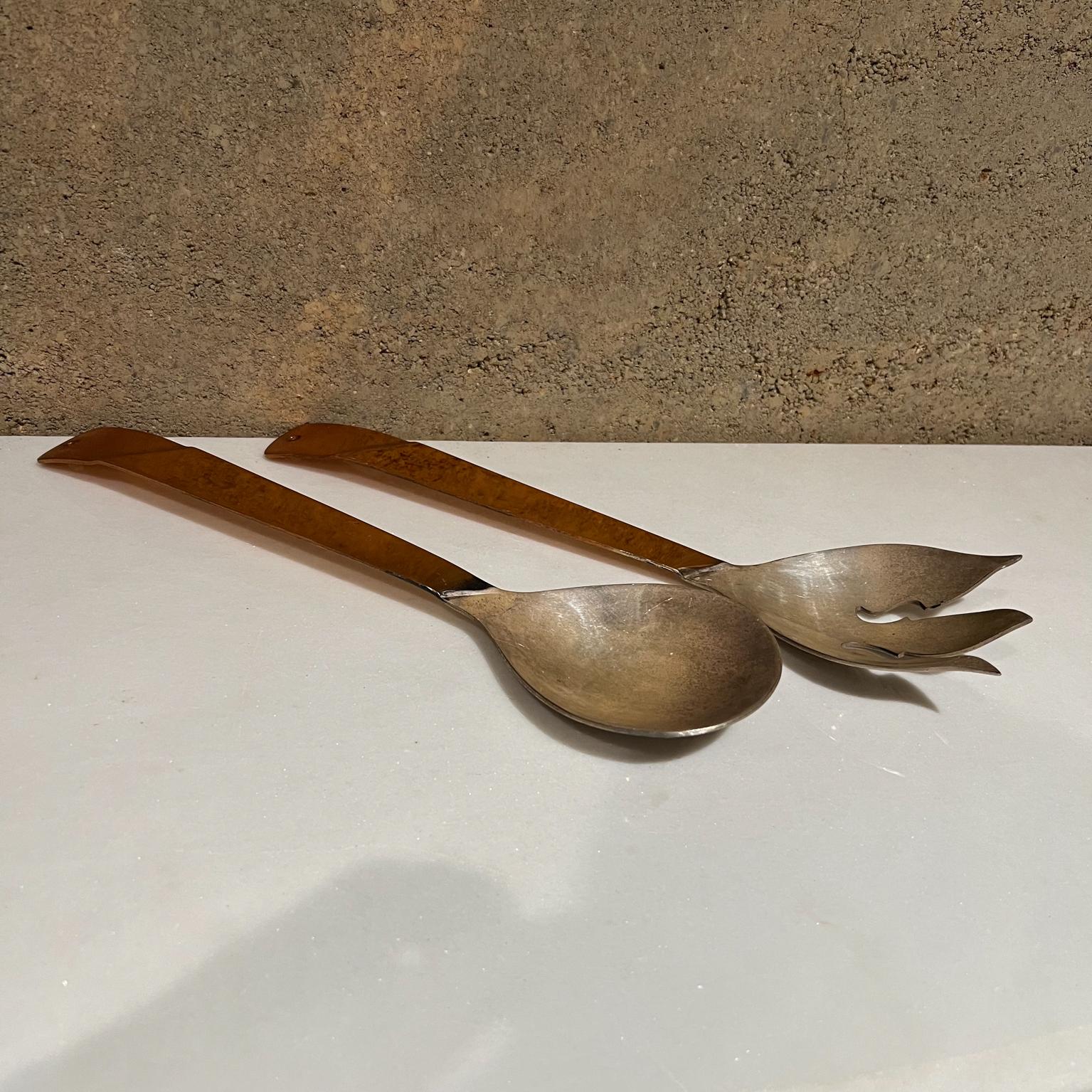 Vintage modern salad serving utensil set William Spratling Style 
Spoon 12.38 x 3.38 w x 1.5 tall Fork 1.25 tall x 12.63 long x 3.38 w
Original unrestored vintage condition.
See images provided.
 