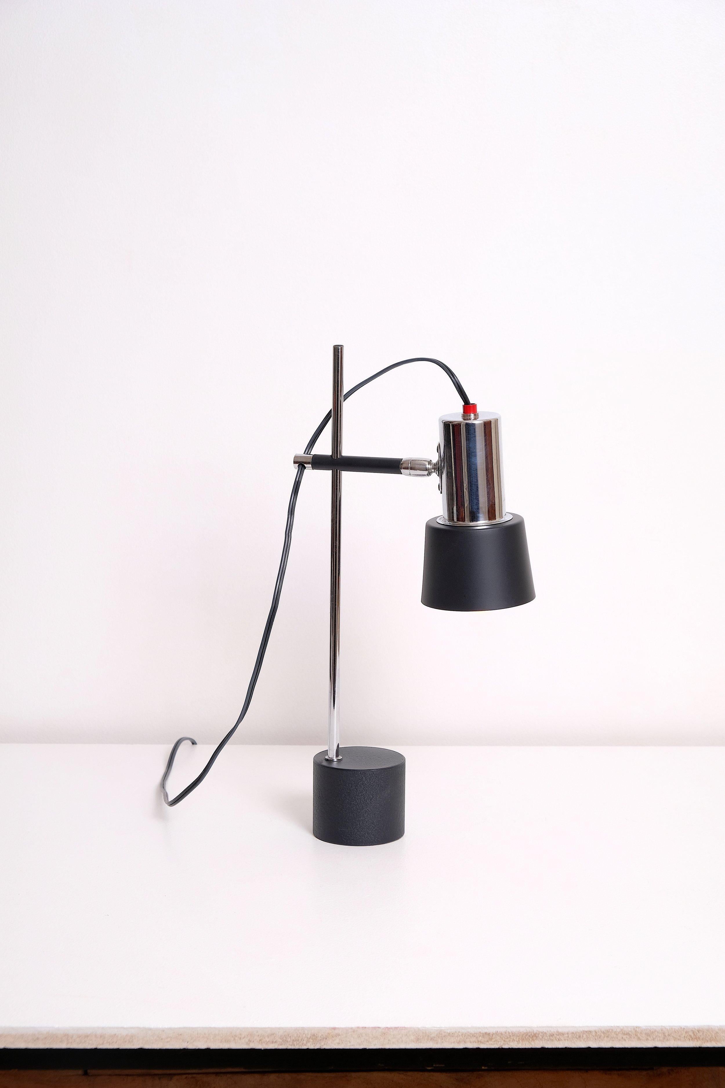 Small desk lamp made in Italy. Chromed brass and lacquered aluminium shade, chromed brass fittings, lacquered steel base. 40 watts max E-12 North American bulb recommended or higher if LED/CFL.

Rewired with a E-12 candelabra base socket, 18/2 black
